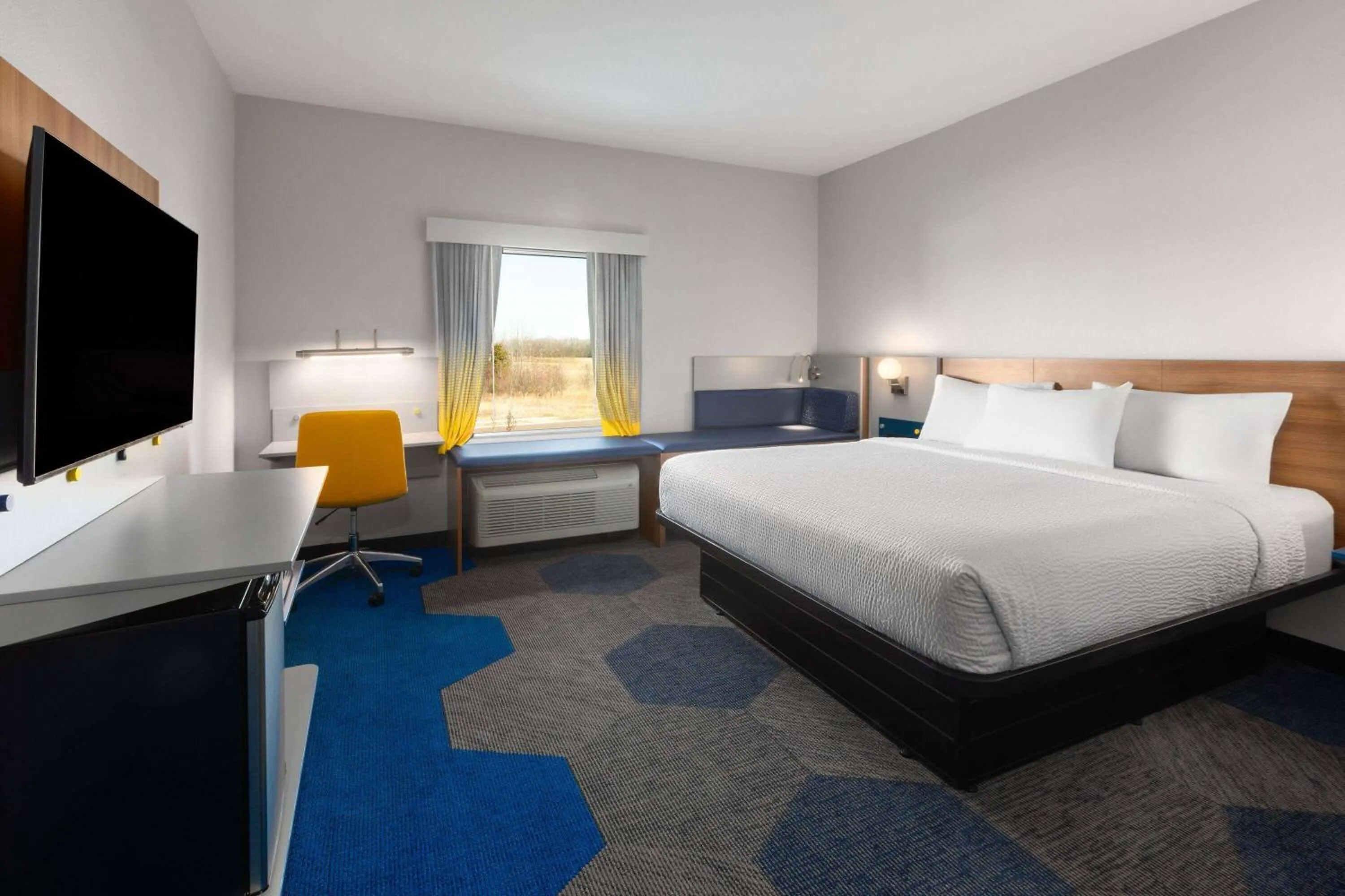Photo of the whole room, Bed in Microtel Inn & Suites by Wyndham Olive Branch