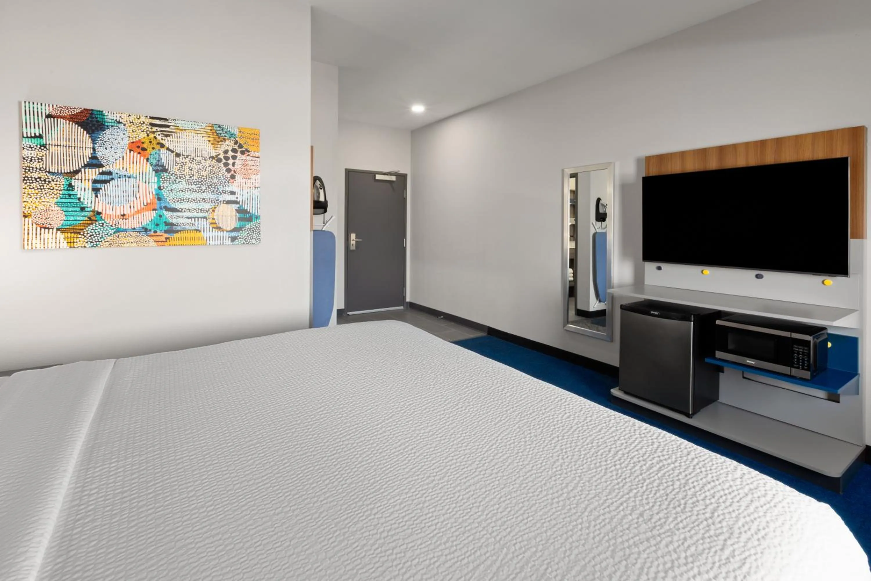 Bed in Microtel Inn & Suites by Wyndham Olive Branch