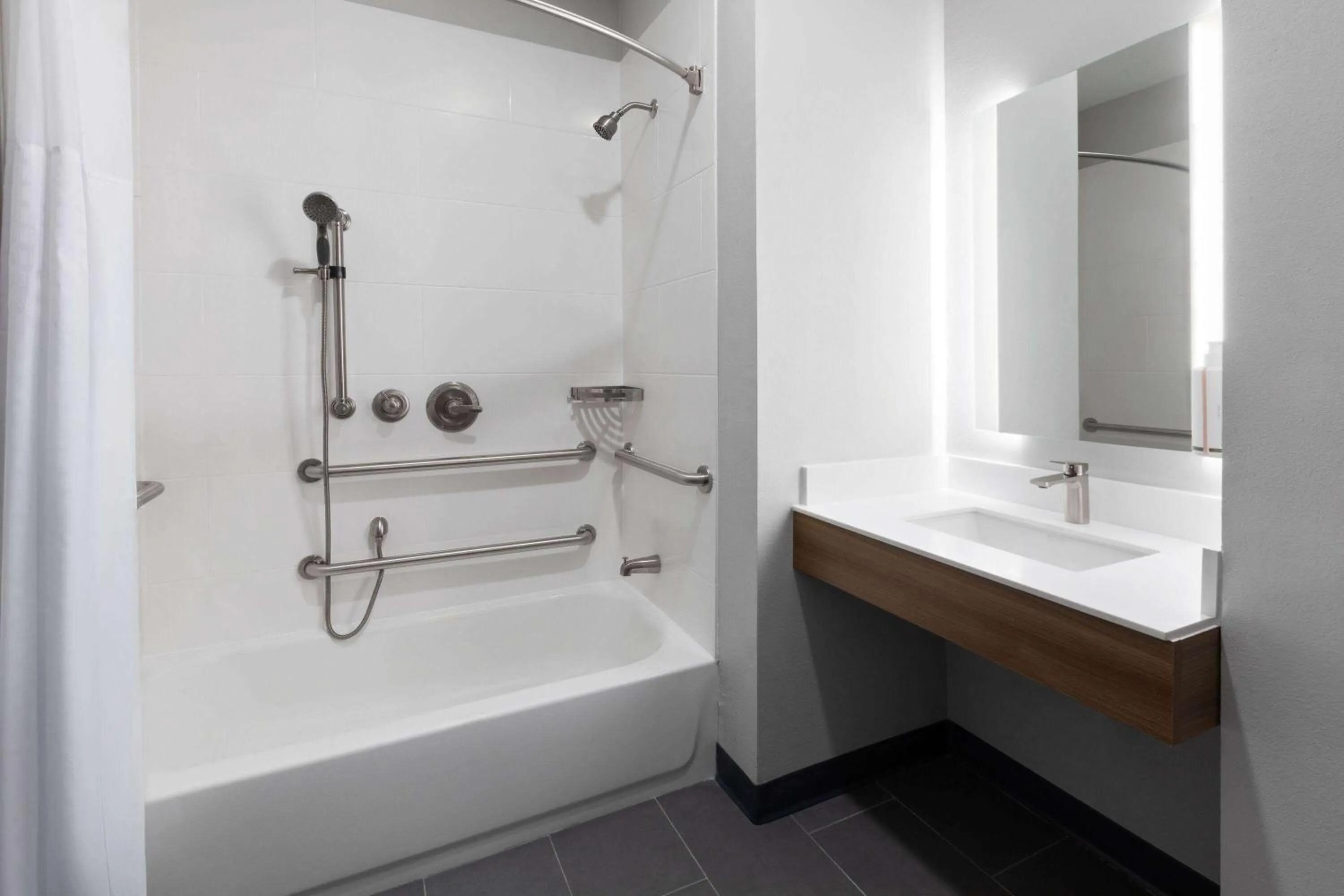 Bathroom in Microtel Inn & Suites by Wyndham Olive Branch