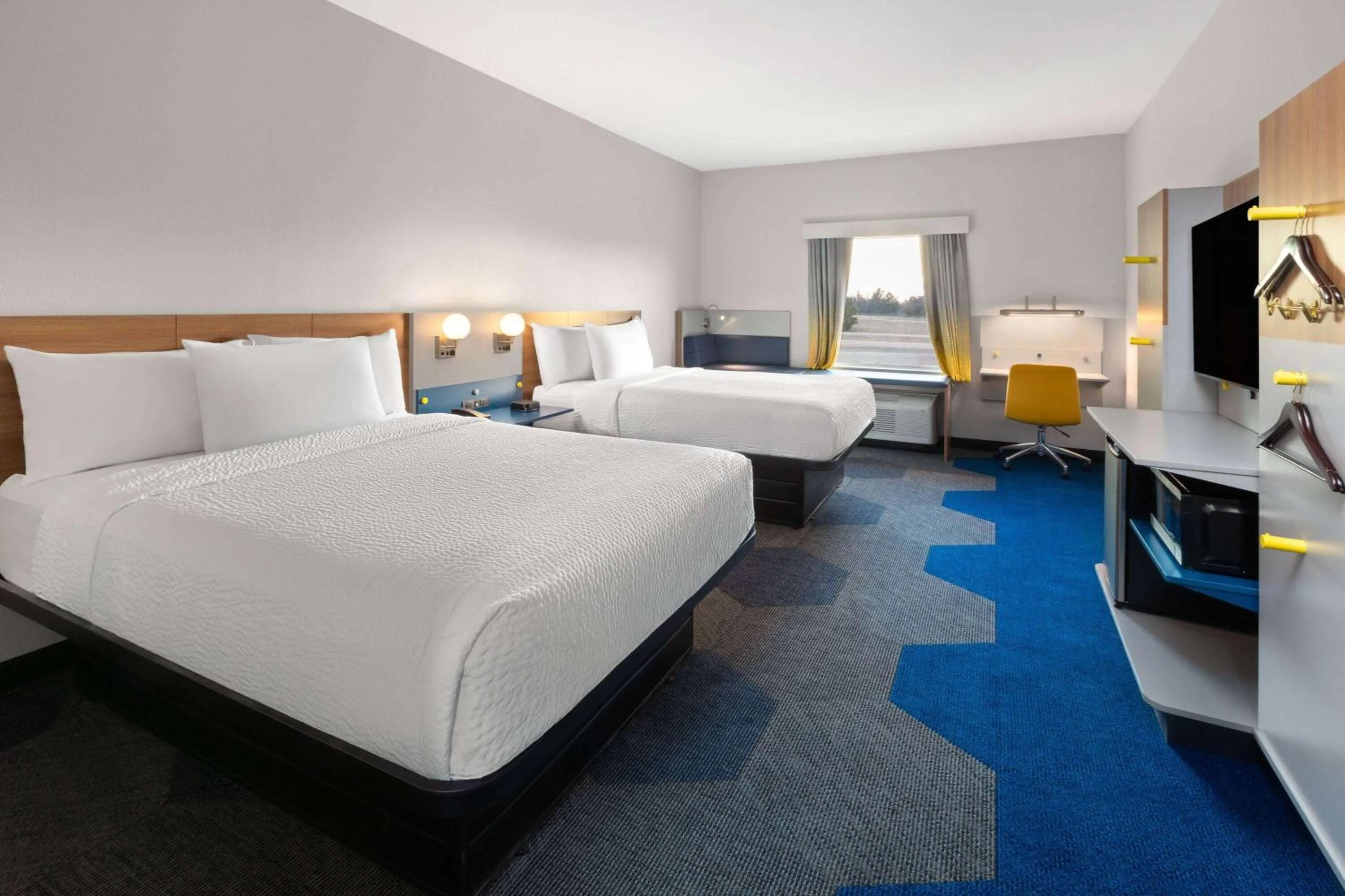 Photo of the whole room, Bed in Microtel Inn & Suites by Wyndham Olive Branch