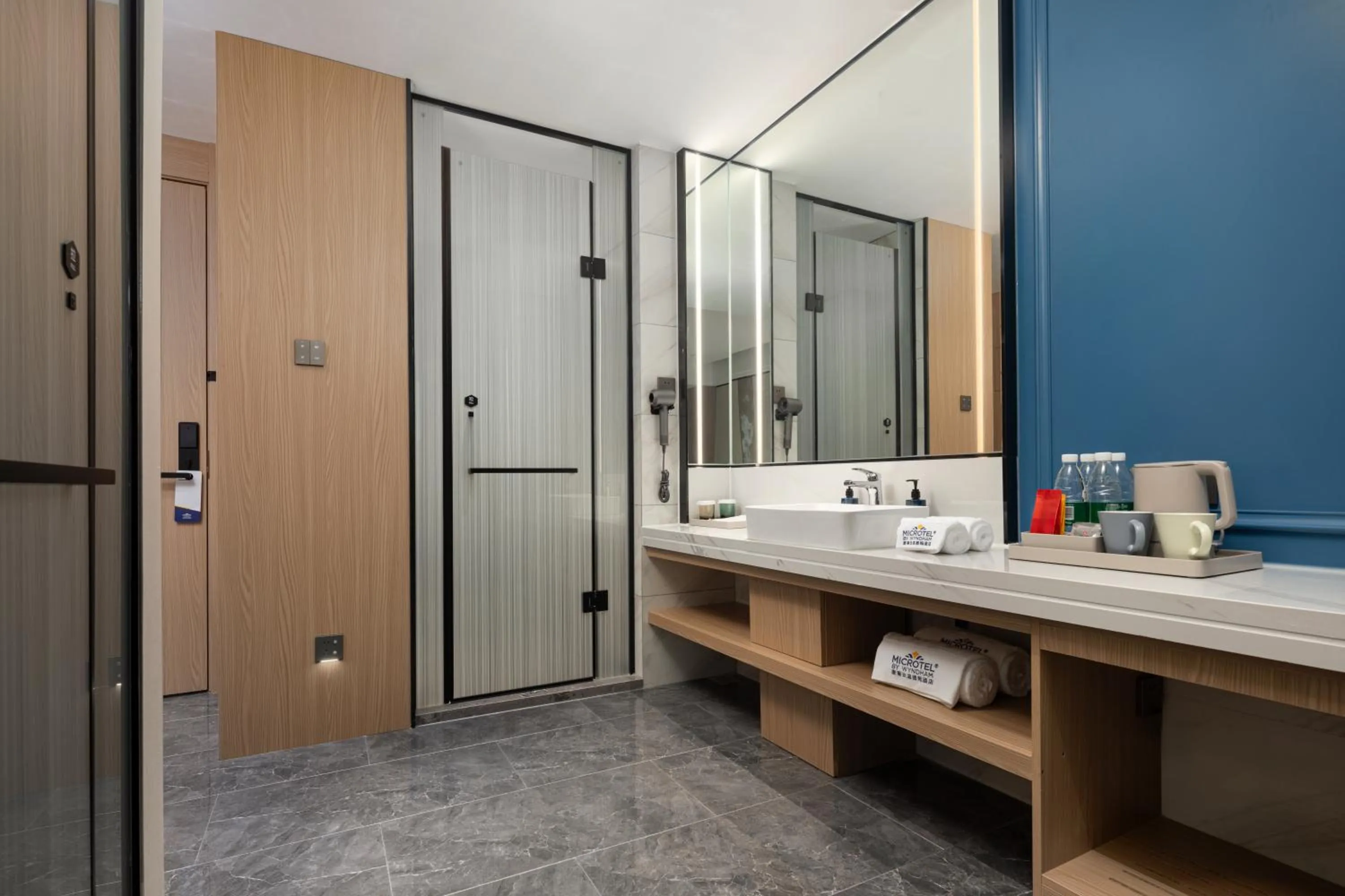 Bathroom in Microtel by Wyndham Qingdao Huangdao