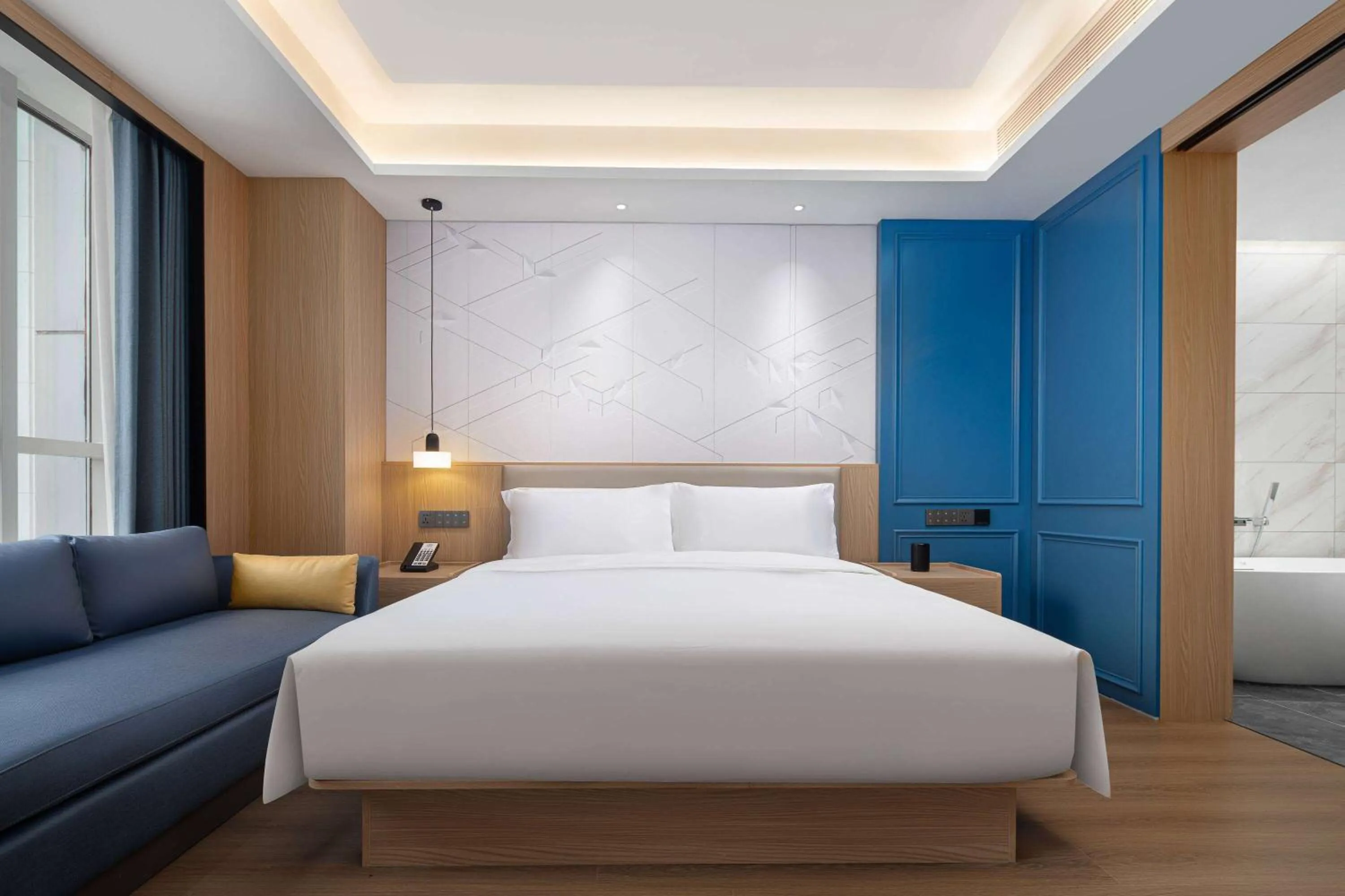 Photo of the whole room, Bed in Microtel by Wyndham Qingdao Huangdao