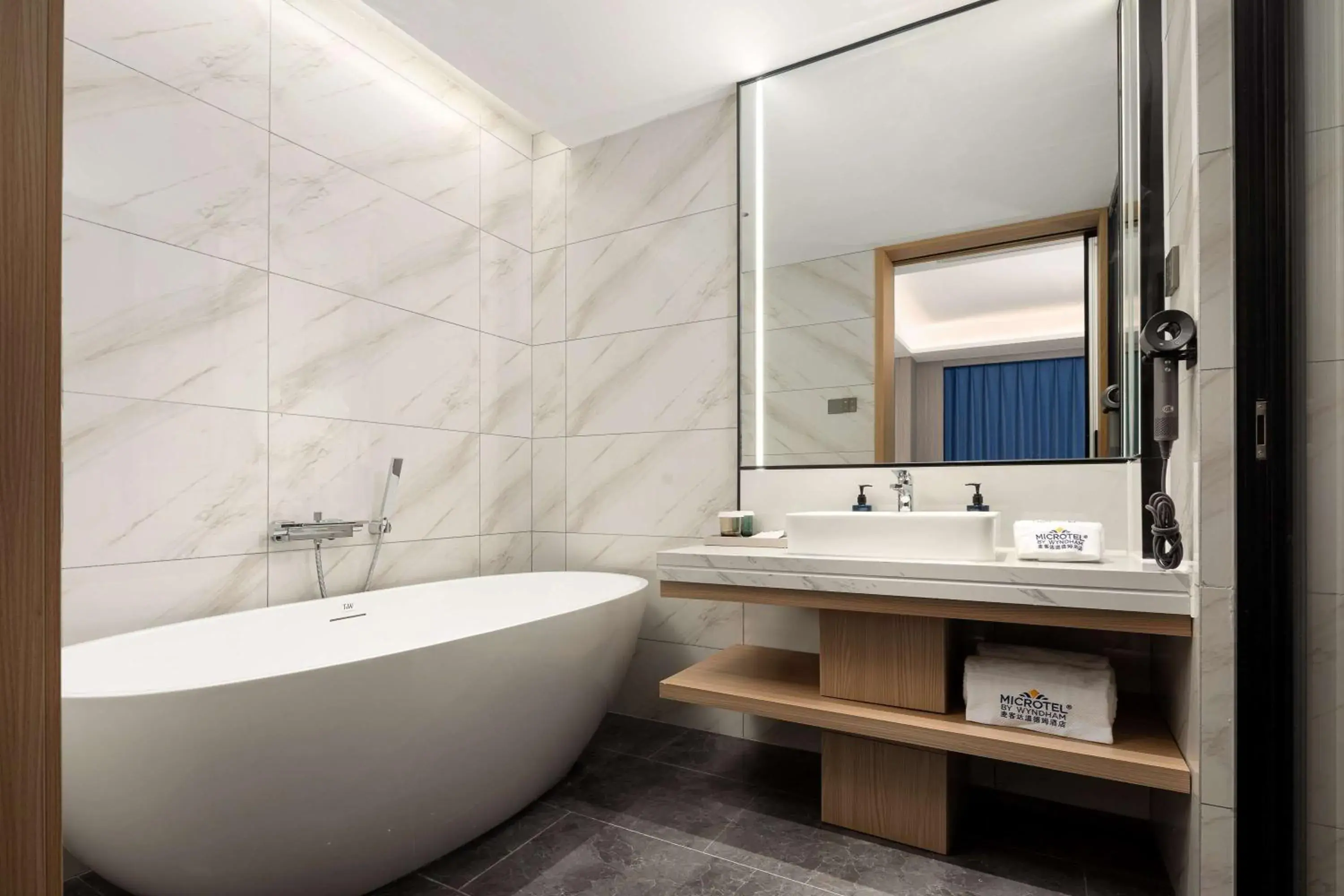 Bedroom in Microtel by Wyndham Qingdao Huangdao Bedroom in Microtel by Wyndham Qingdao Huangdao