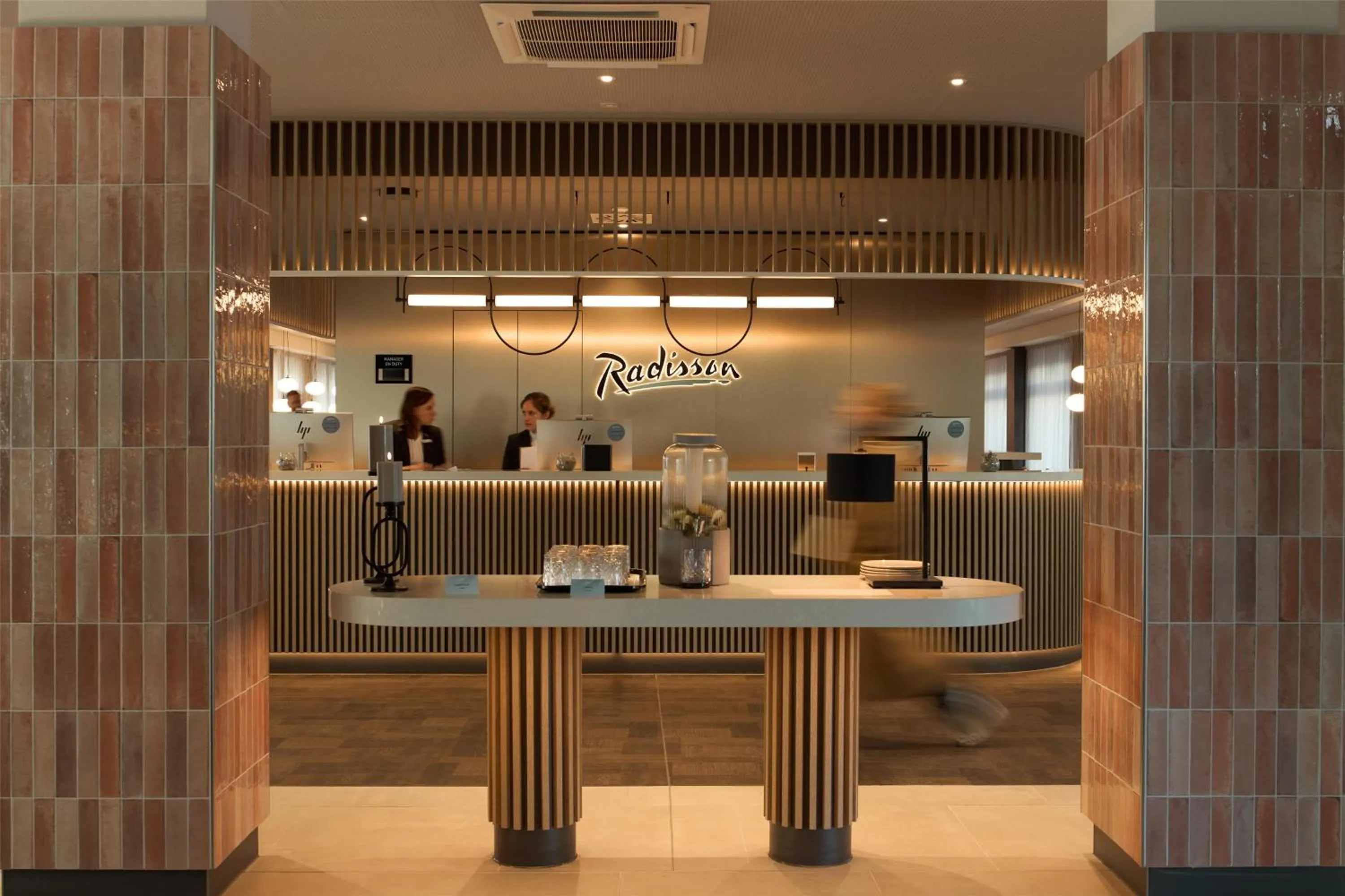 Lobby or reception in Radisson Hotel Leipzig