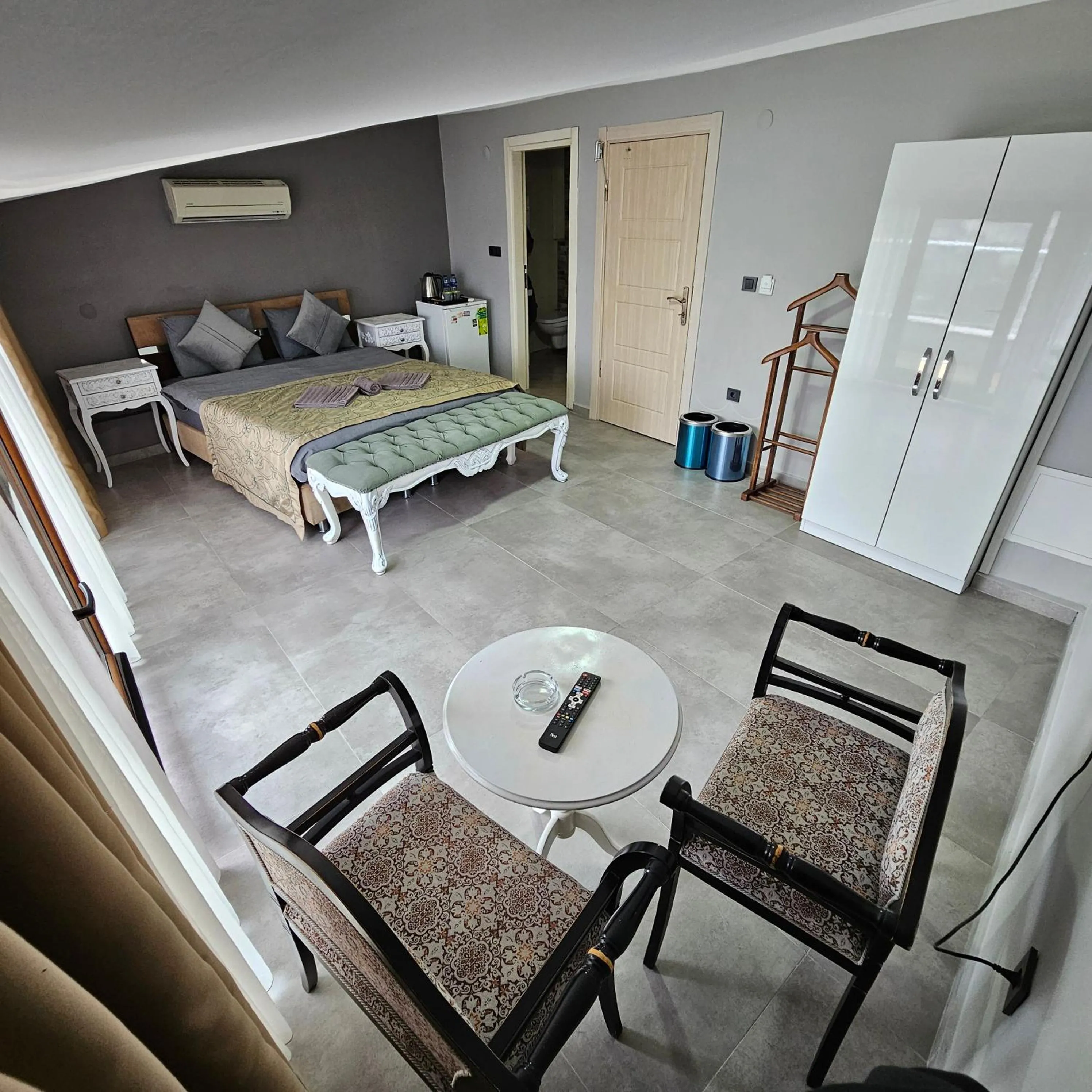 Seating area, Bed in Bude Ortaköy