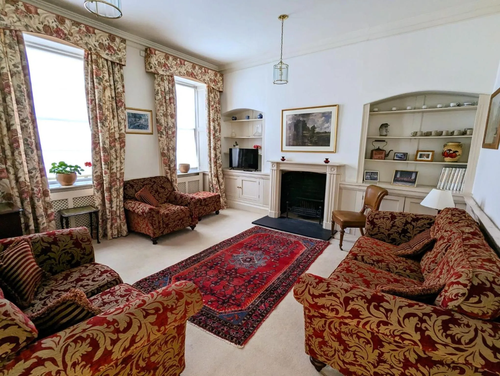 Communal lounge/ TV room in East Pallant Bed and Breakfast, Located in Large Georgian Townhouse in Central Chichester