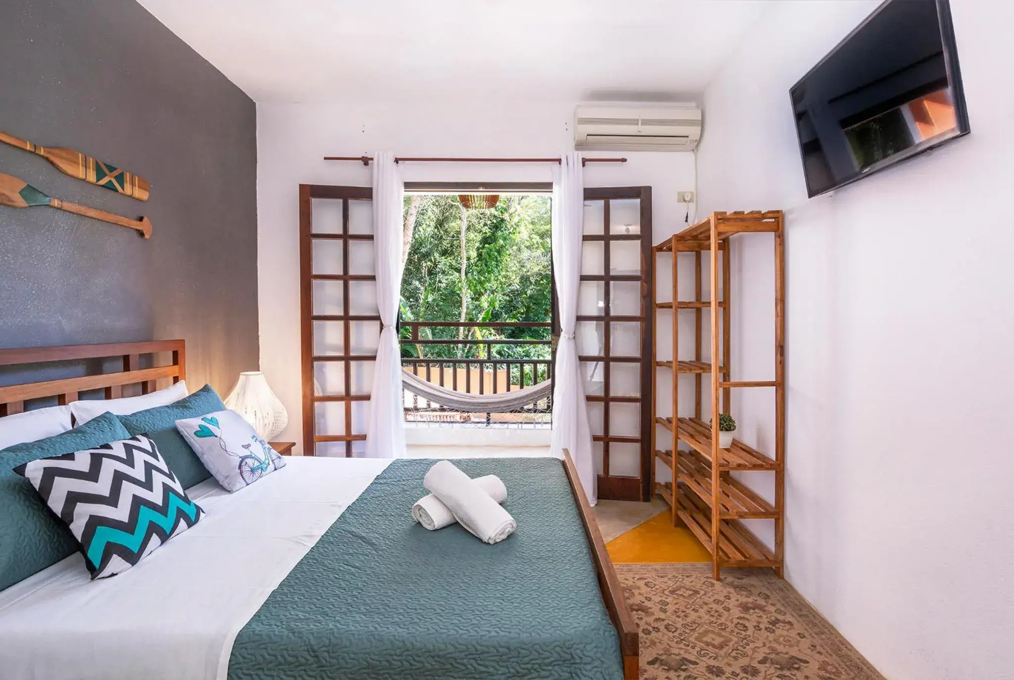 Quarto Duplo com Varanda Superior in Pousada Aysú Maresias Quarto Duplo com Varanda Superior in Pousada Aysú Maresias