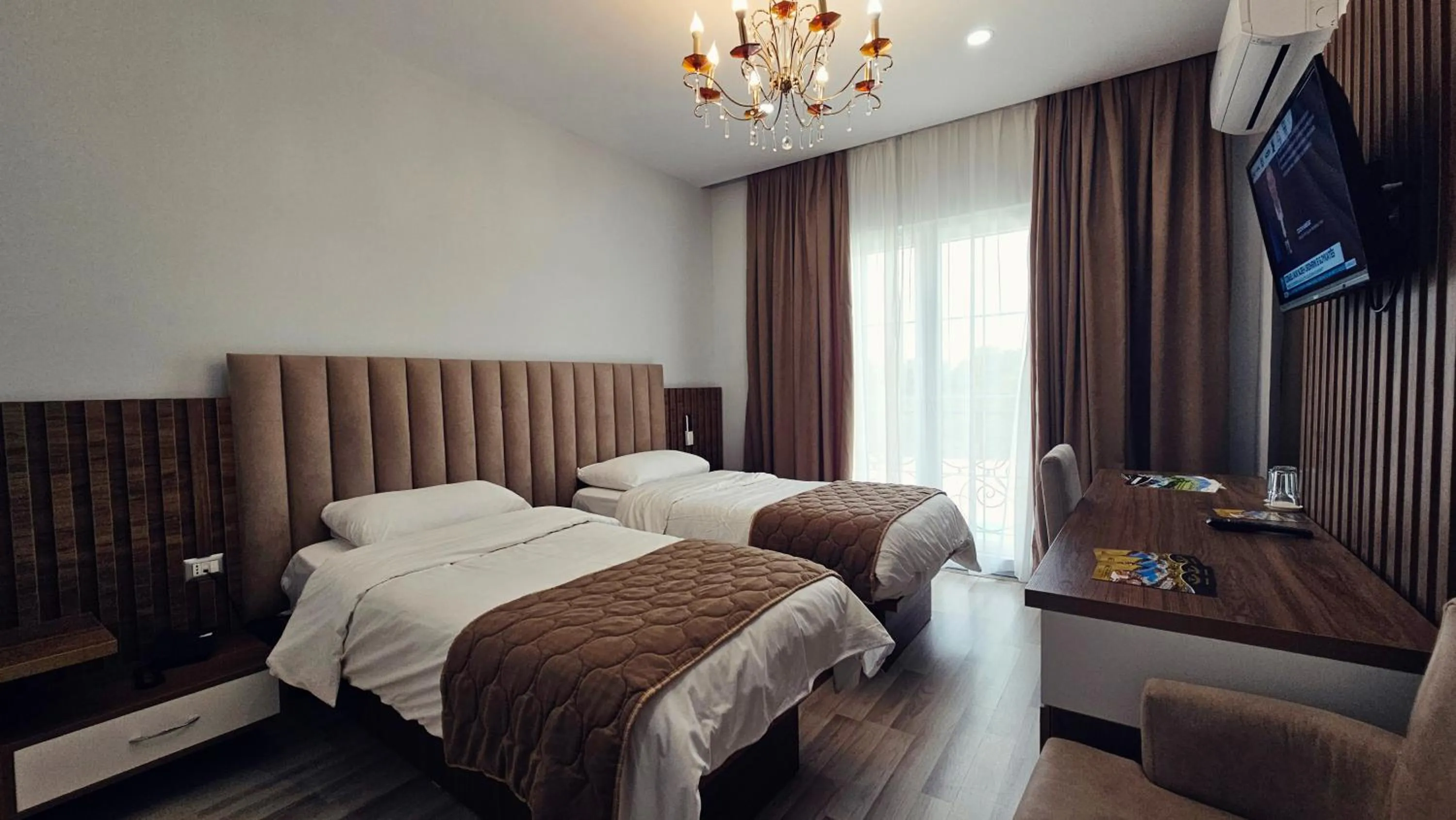 Bed in Gardenland Resort