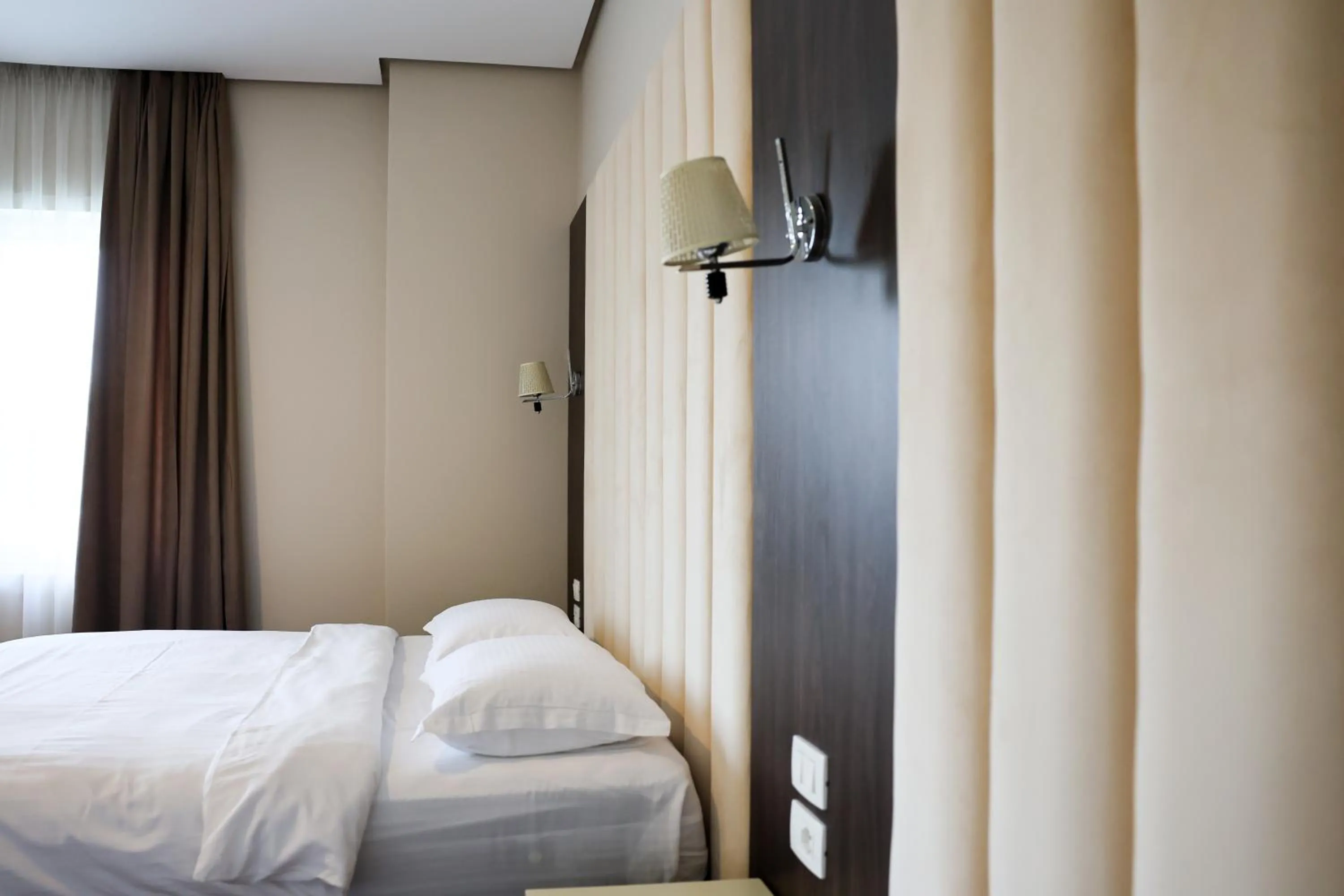 Bed in Gardenland Resort