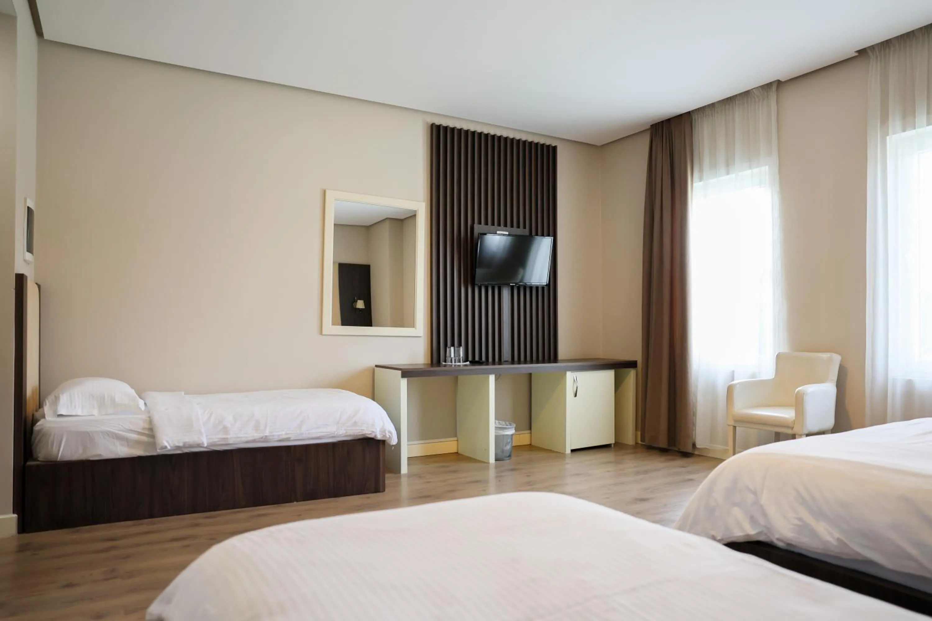 Bed in Gardenland Resort