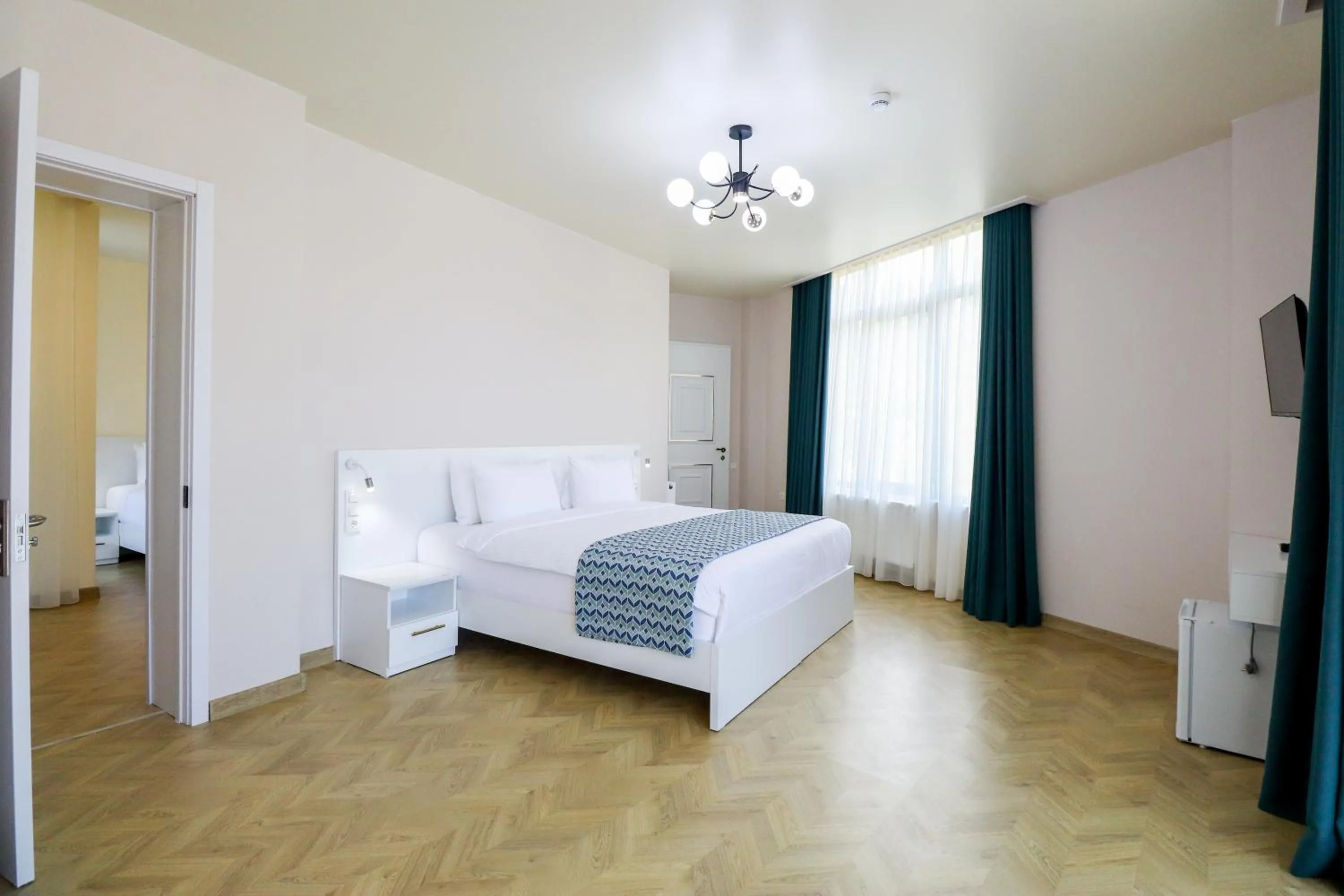 Bed in Emerald Borjomi Hotel