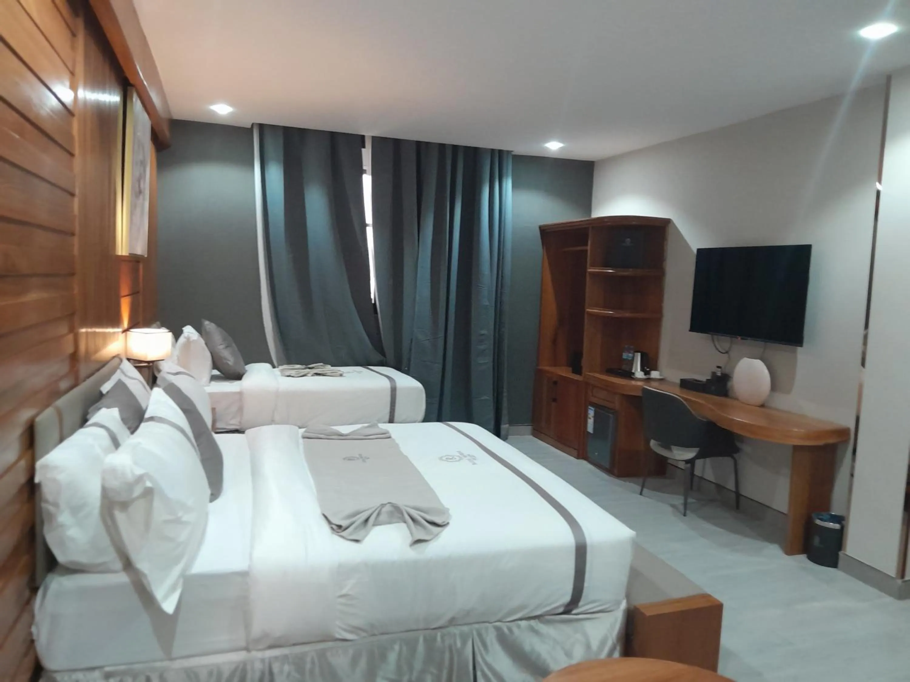 Living room, Bed in Royal Mgwasi Hotel