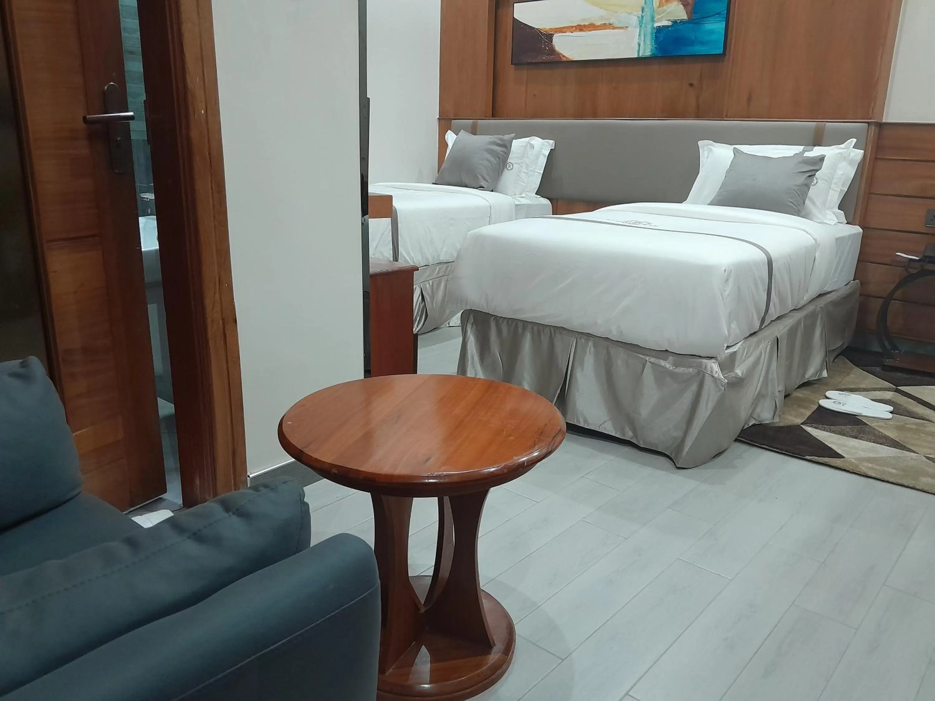 Living room, Bed in Royal Mgwasi Hotel