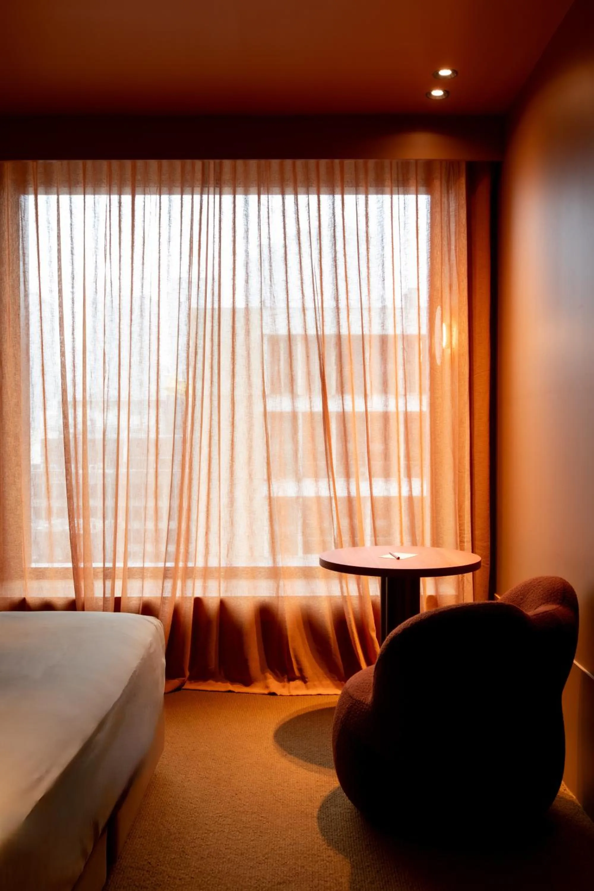 Seating area, Bed in Hyde Melbourne Place