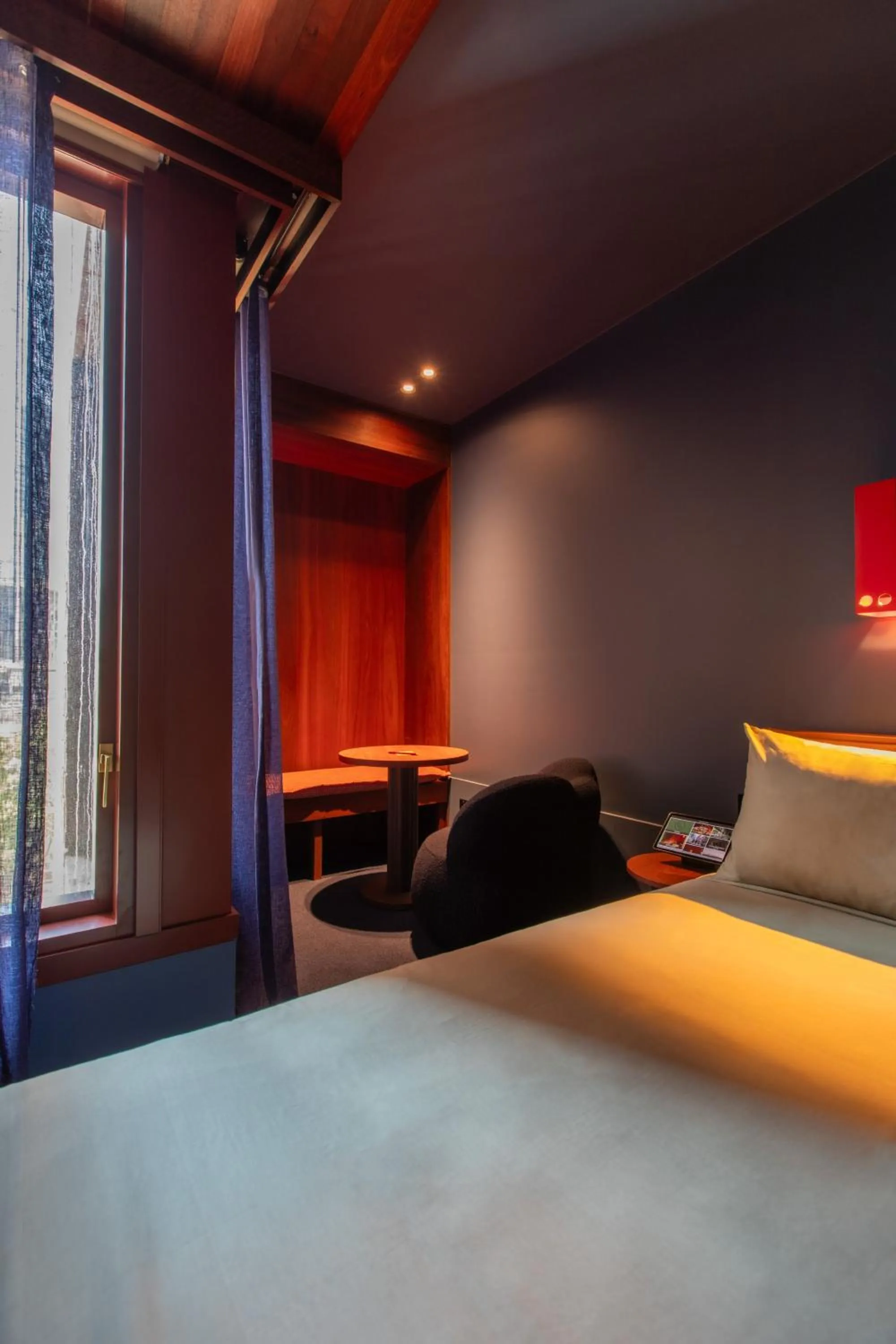 Seating area, Bed in Hyde Melbourne Place