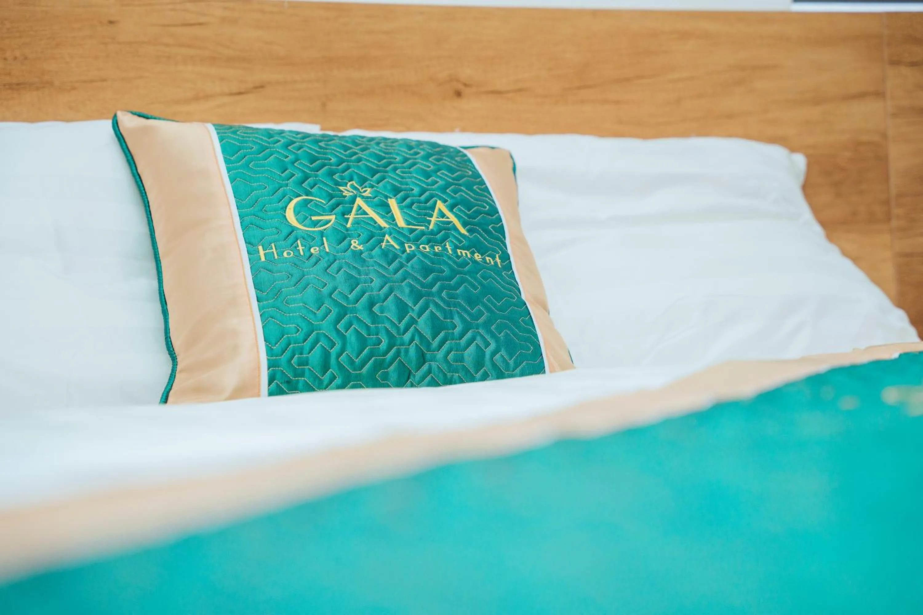 Bed in Gala Hotel & Apartment