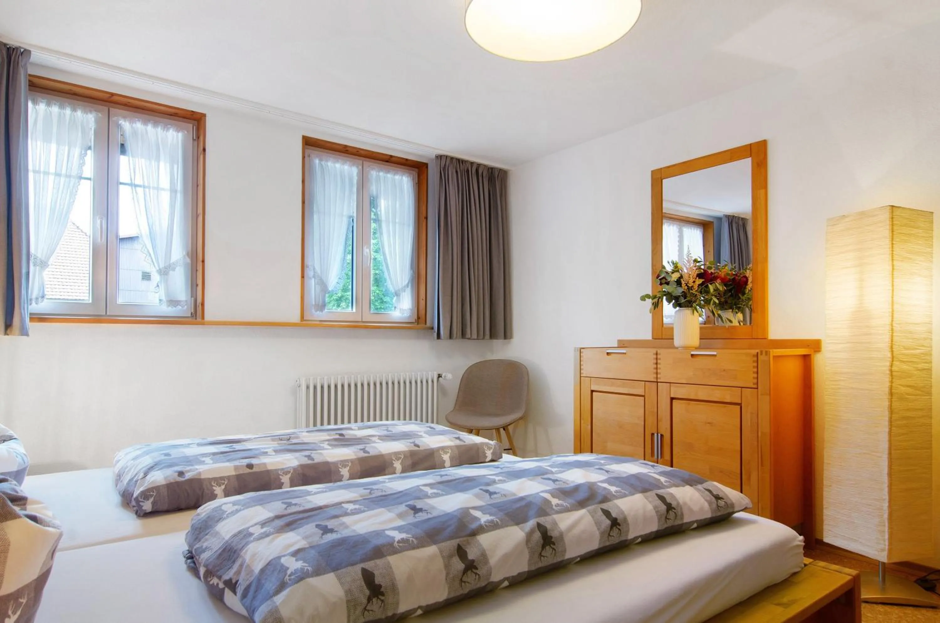 Living room, Bed in Pension Ferienwohnung Baarblick
