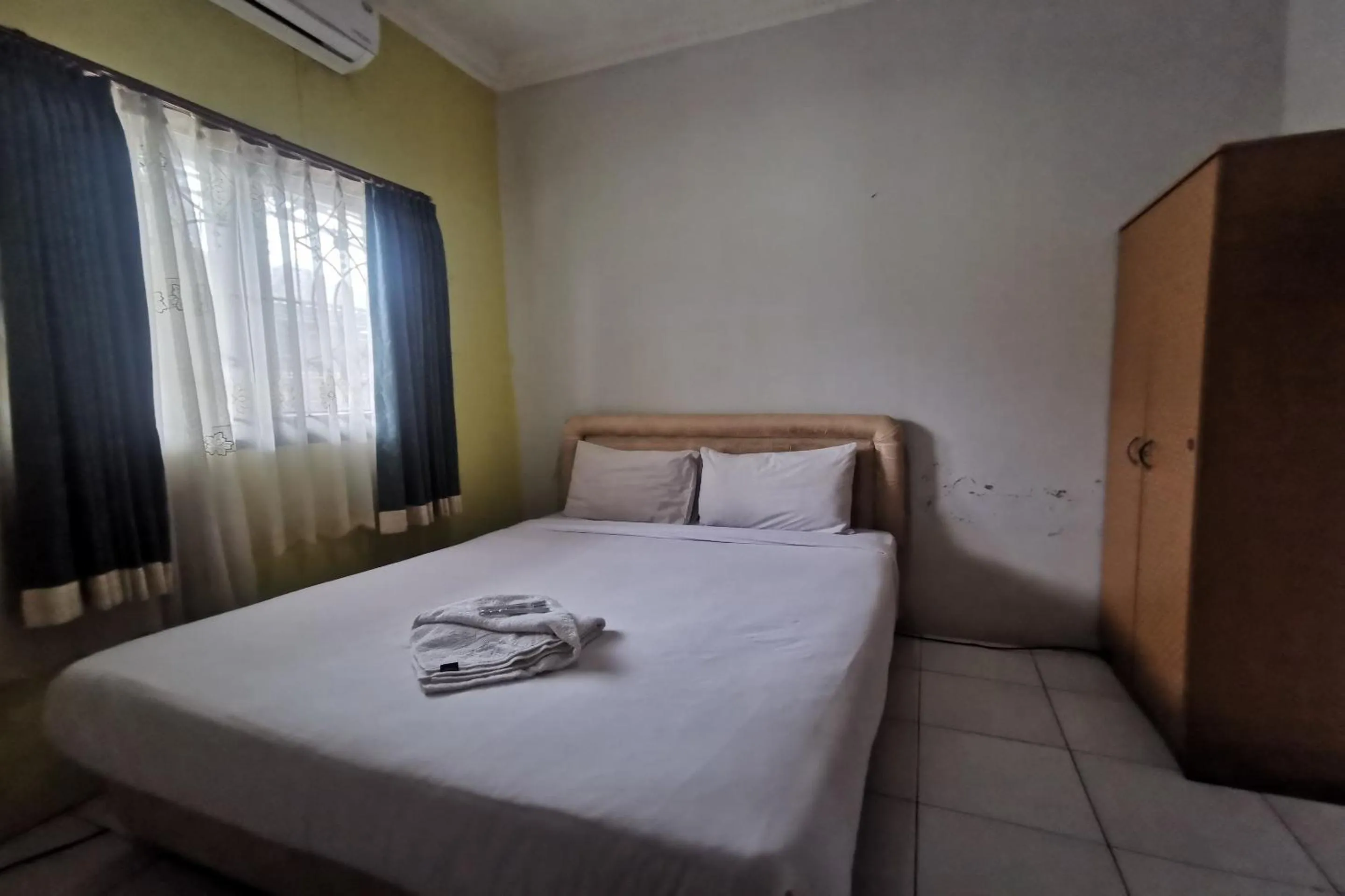 Bedroom, Bed in Hotel O Widan Homestay