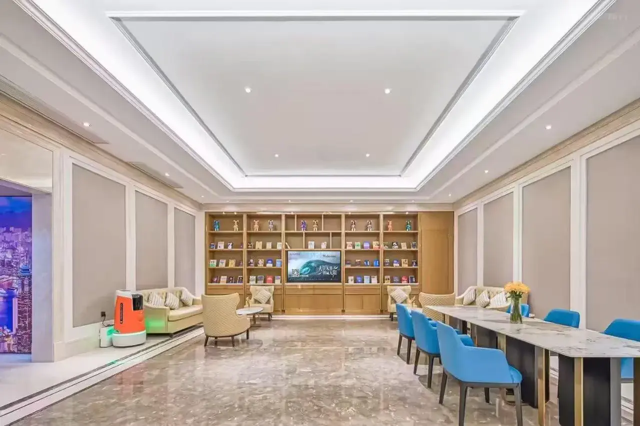 Living room in Vienna Hotel Jiangjin Wanda Plaza Shengquansi Subway Station Living room in Vienna Hotel Jiangjin Wanda Plaza Shengquansi Subway Station