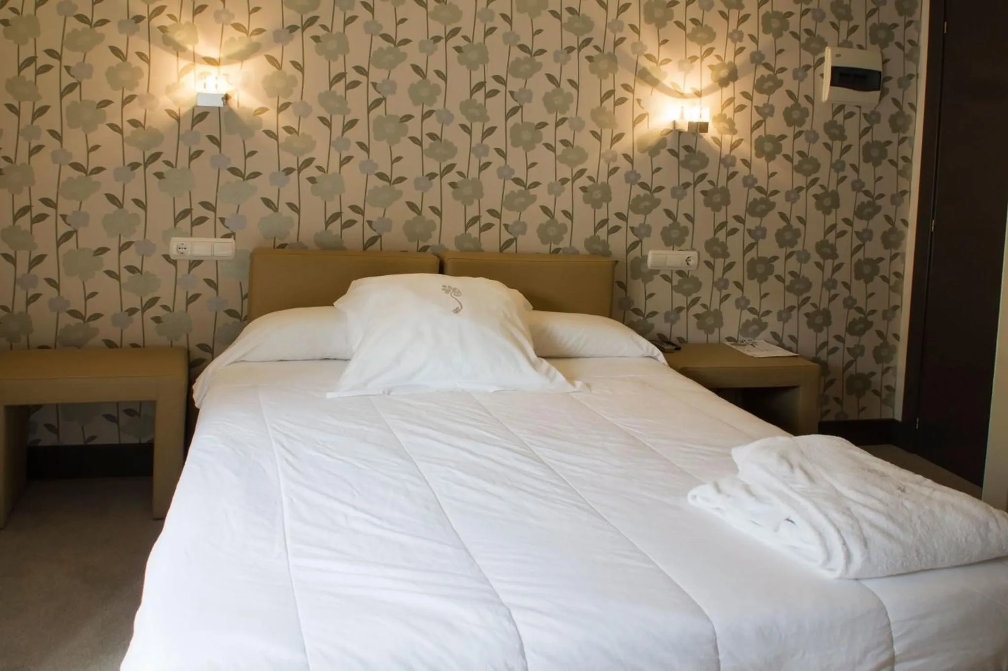 Bed in Hotel Teratermal