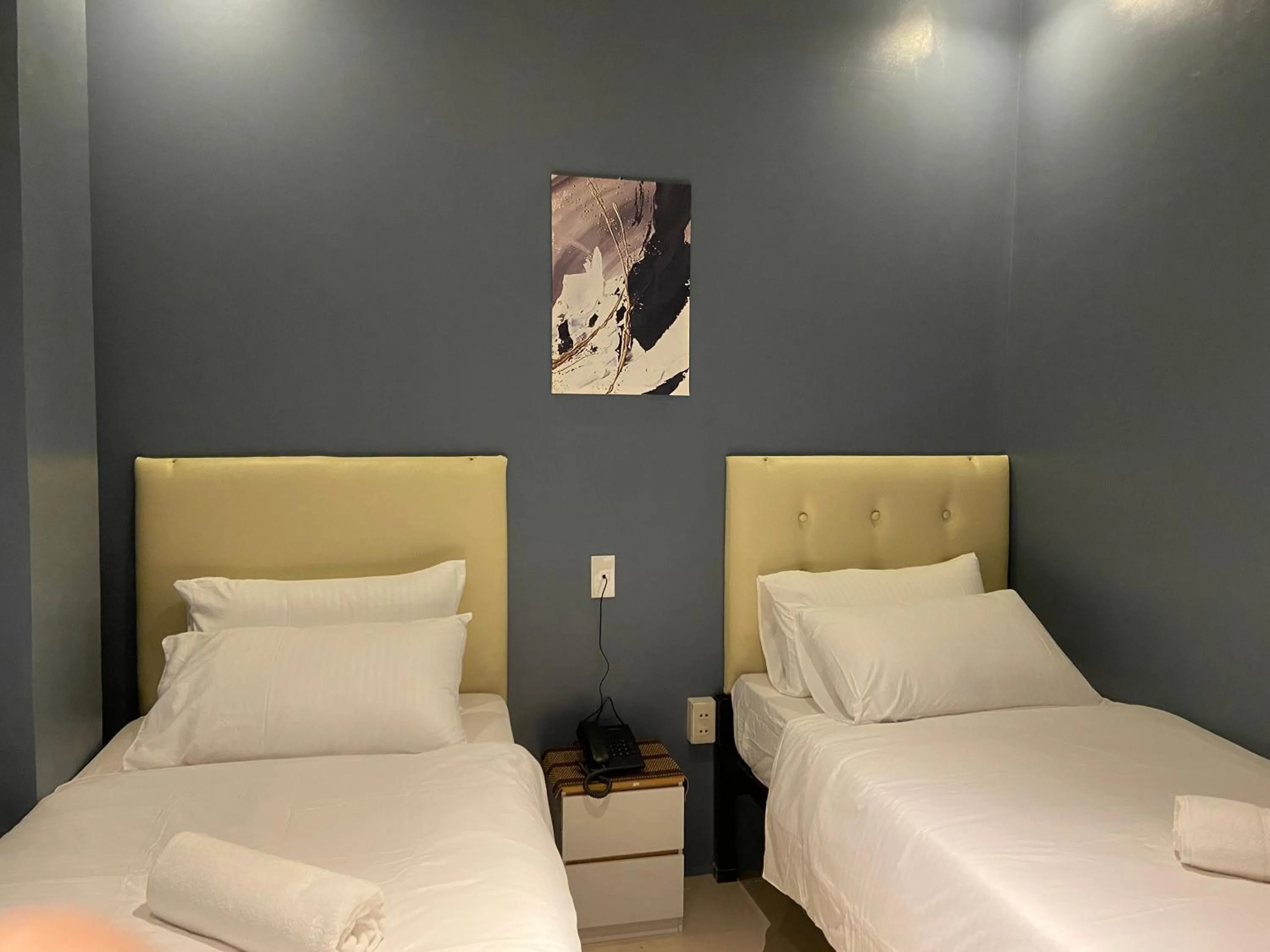 Bed in IAO Boutique Hotel