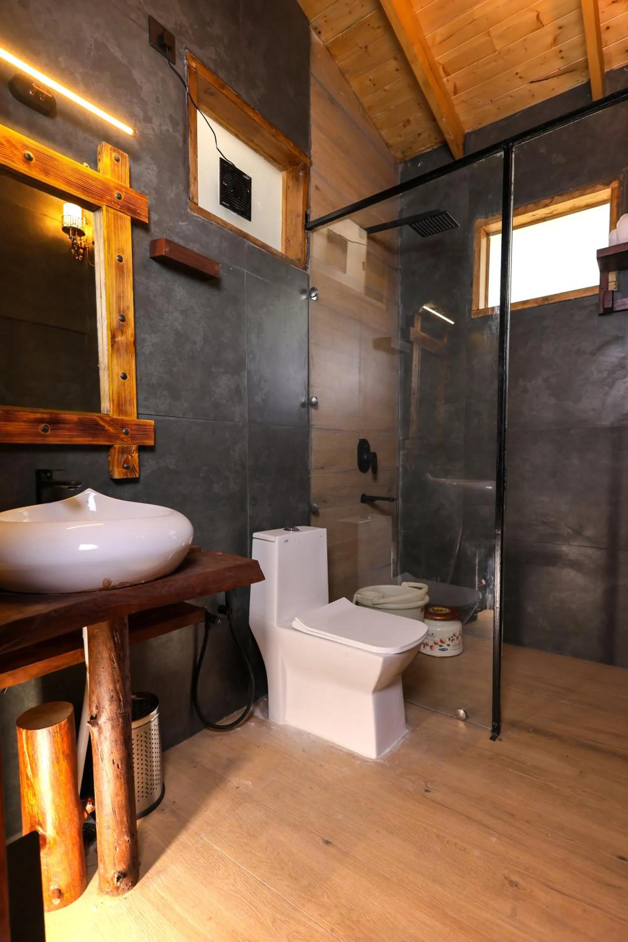Shower in Koro Treehouse Resort Luxury Wooden Cottages and Villas with Private Pool
