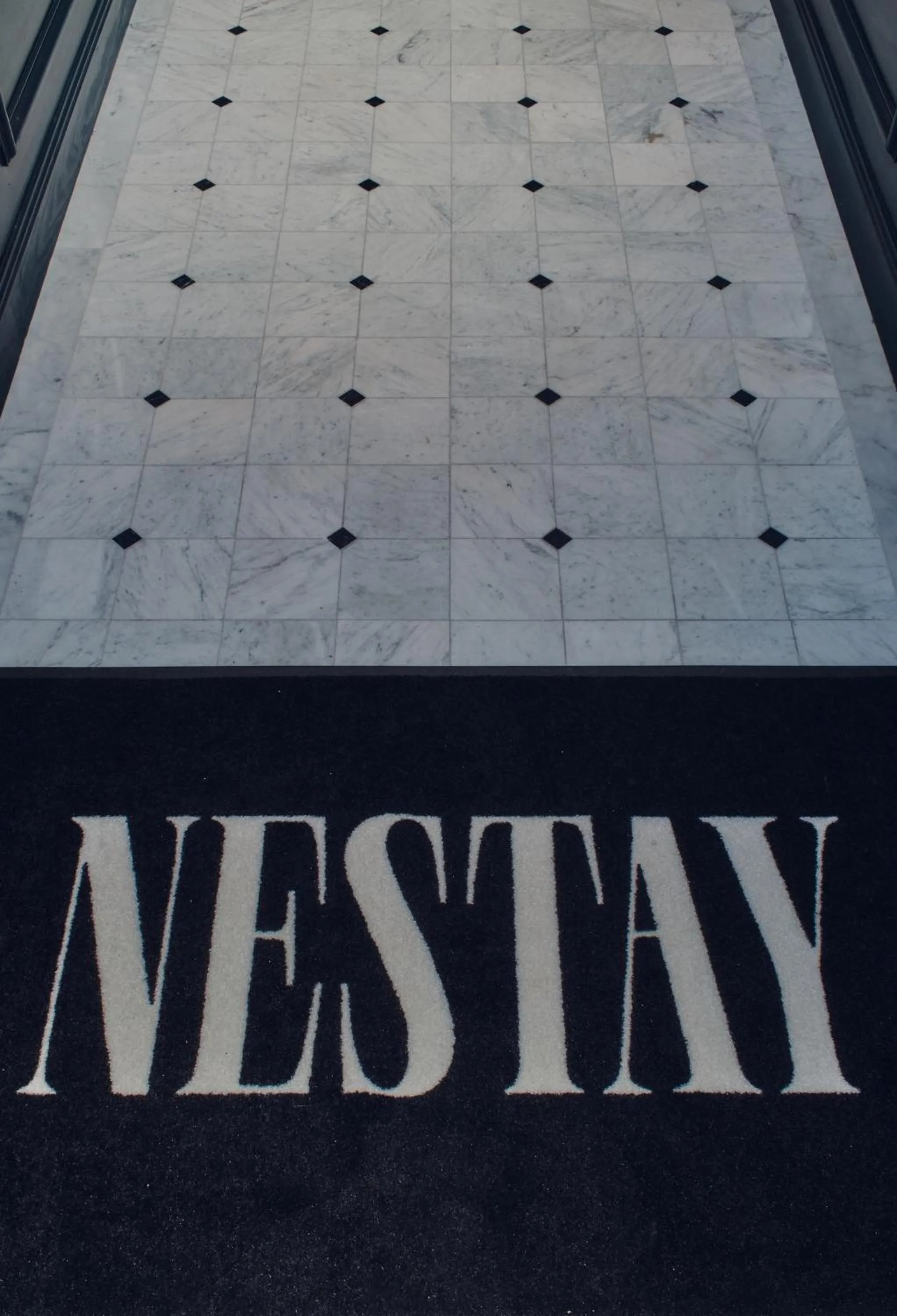 Property logo or sign in Nestay Sentier