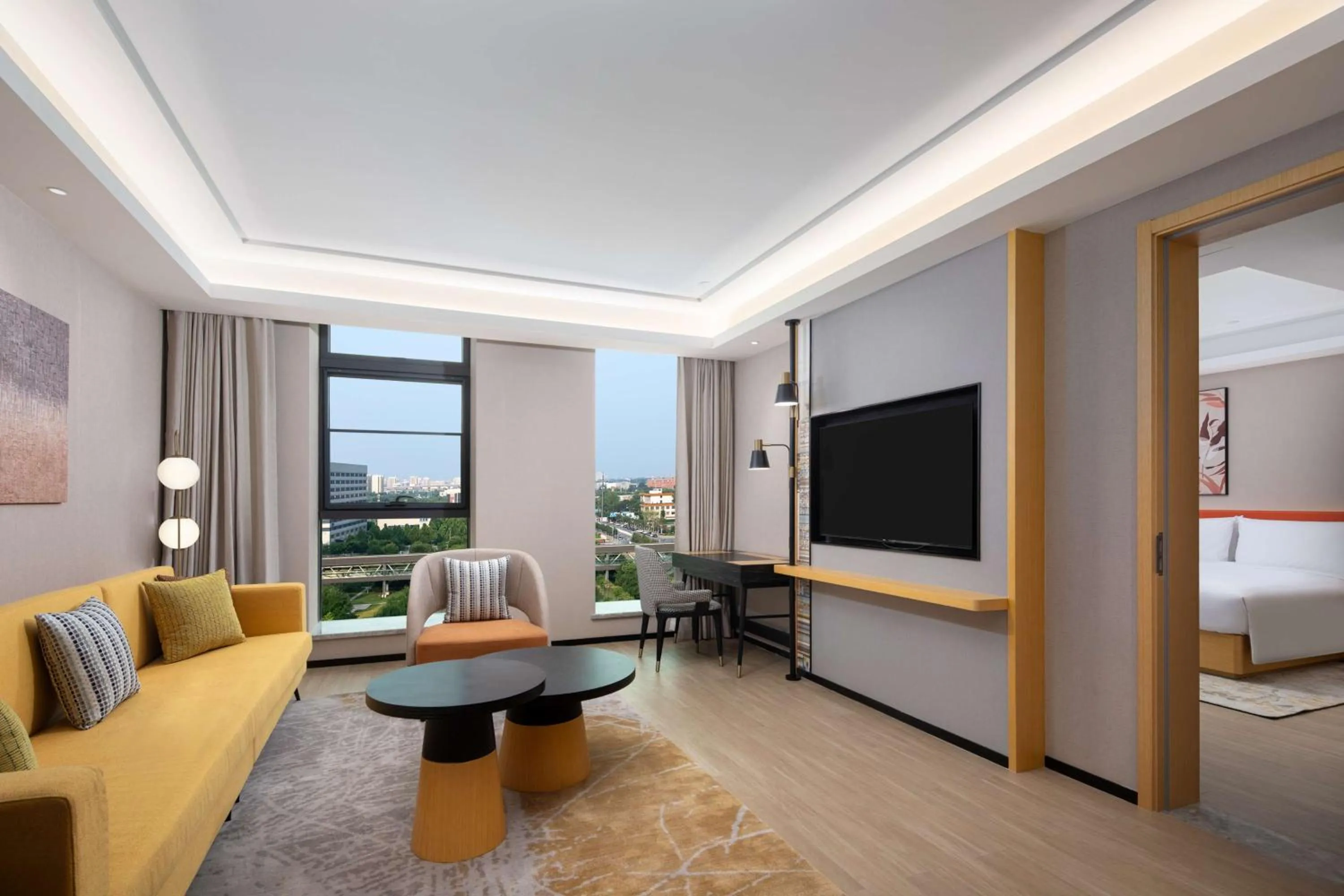 Living room, Bed in Hilton Garden Inn Beijing Huaxiang Tiantan Hospital