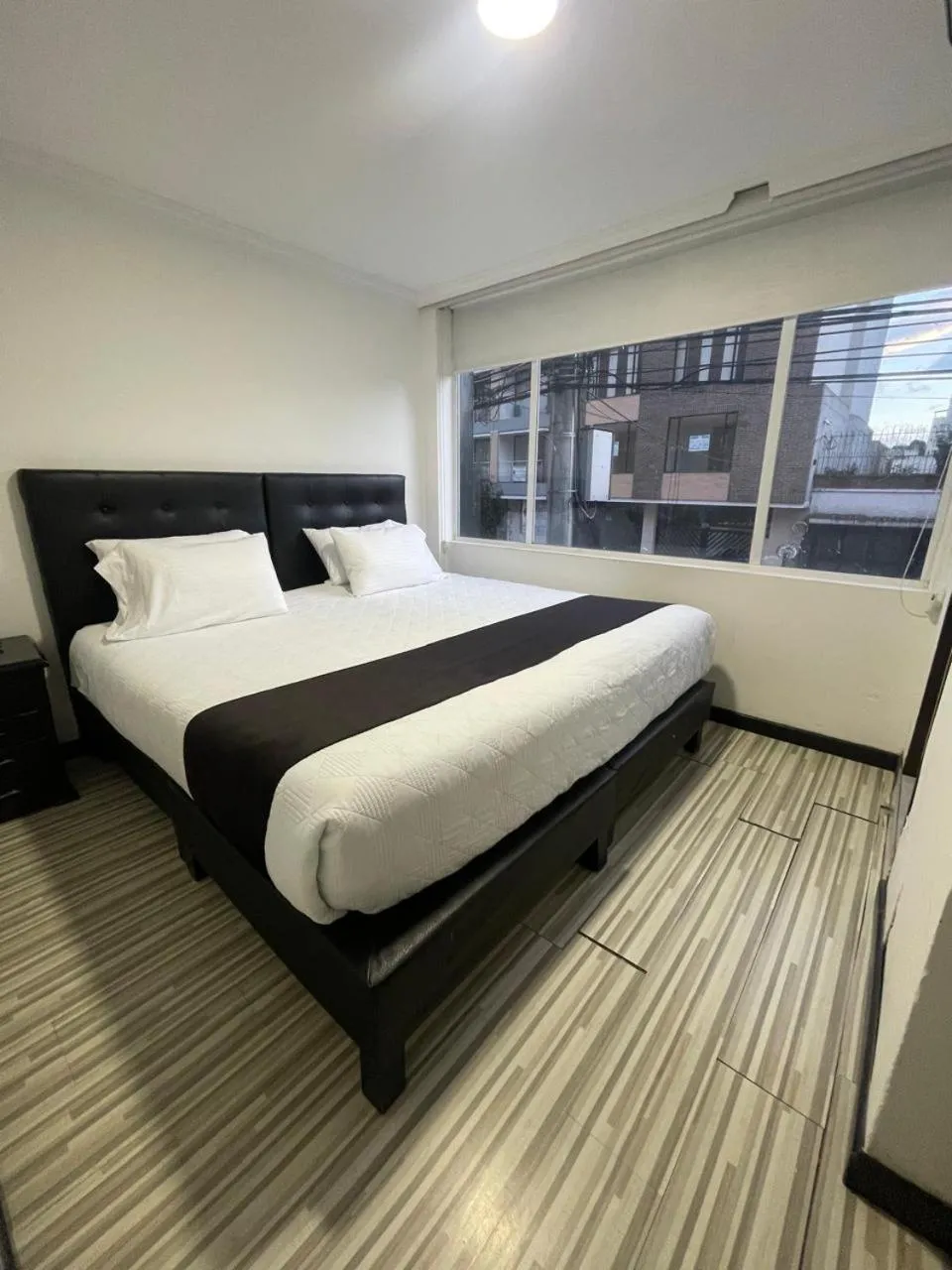 Bed in Hotel AMBAR KING