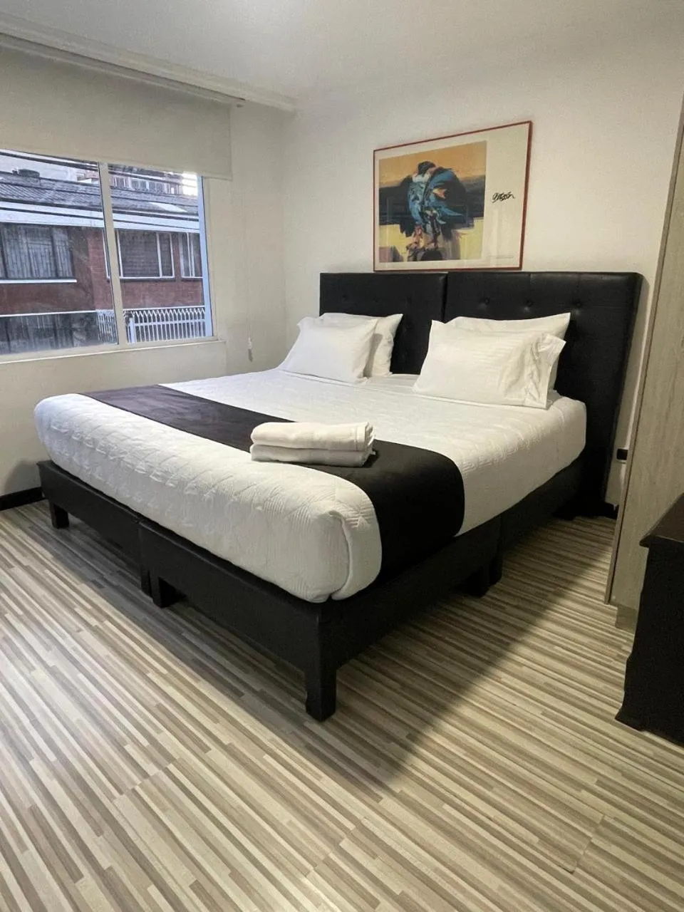 Bed in Hotel AMBAR KING