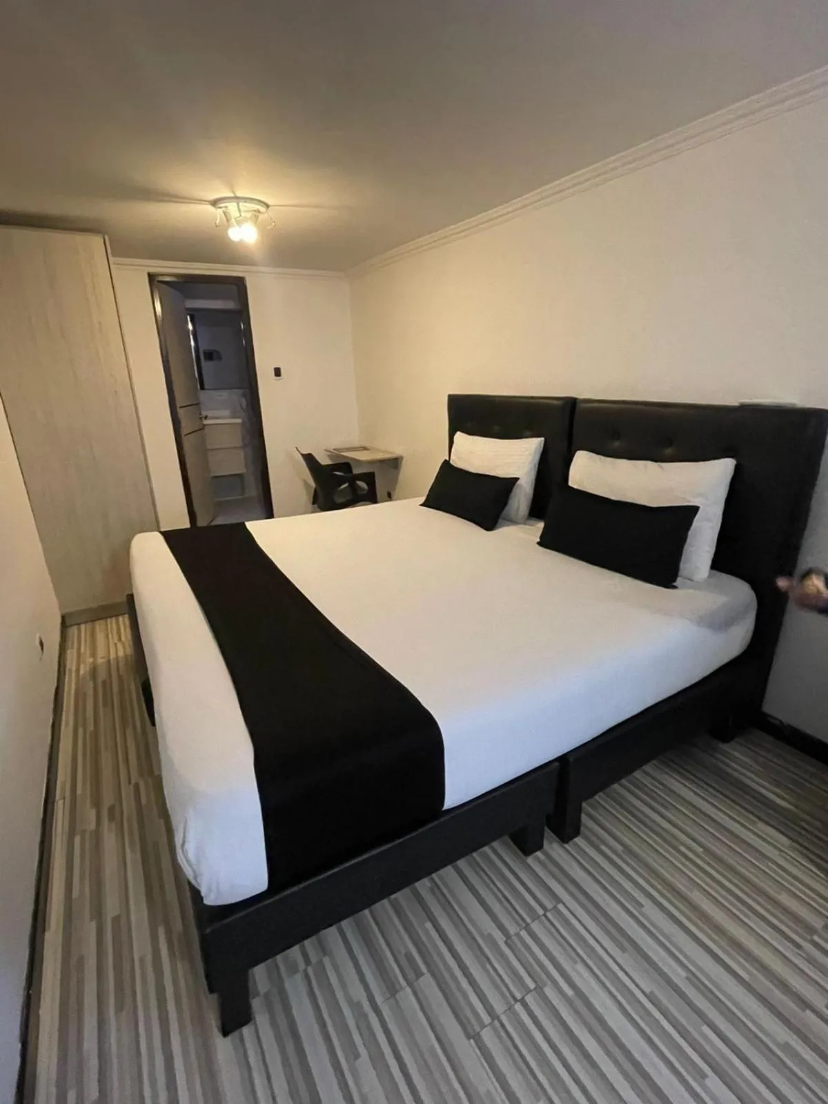 Bed in Hotel AMBAR KING