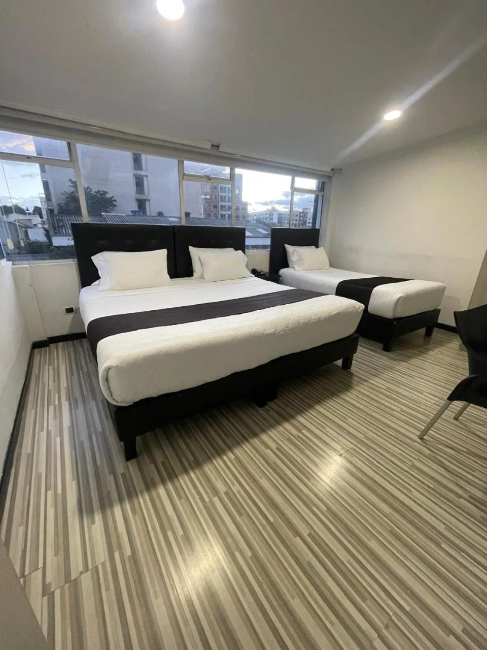 Bed in Hotel AMBAR KING