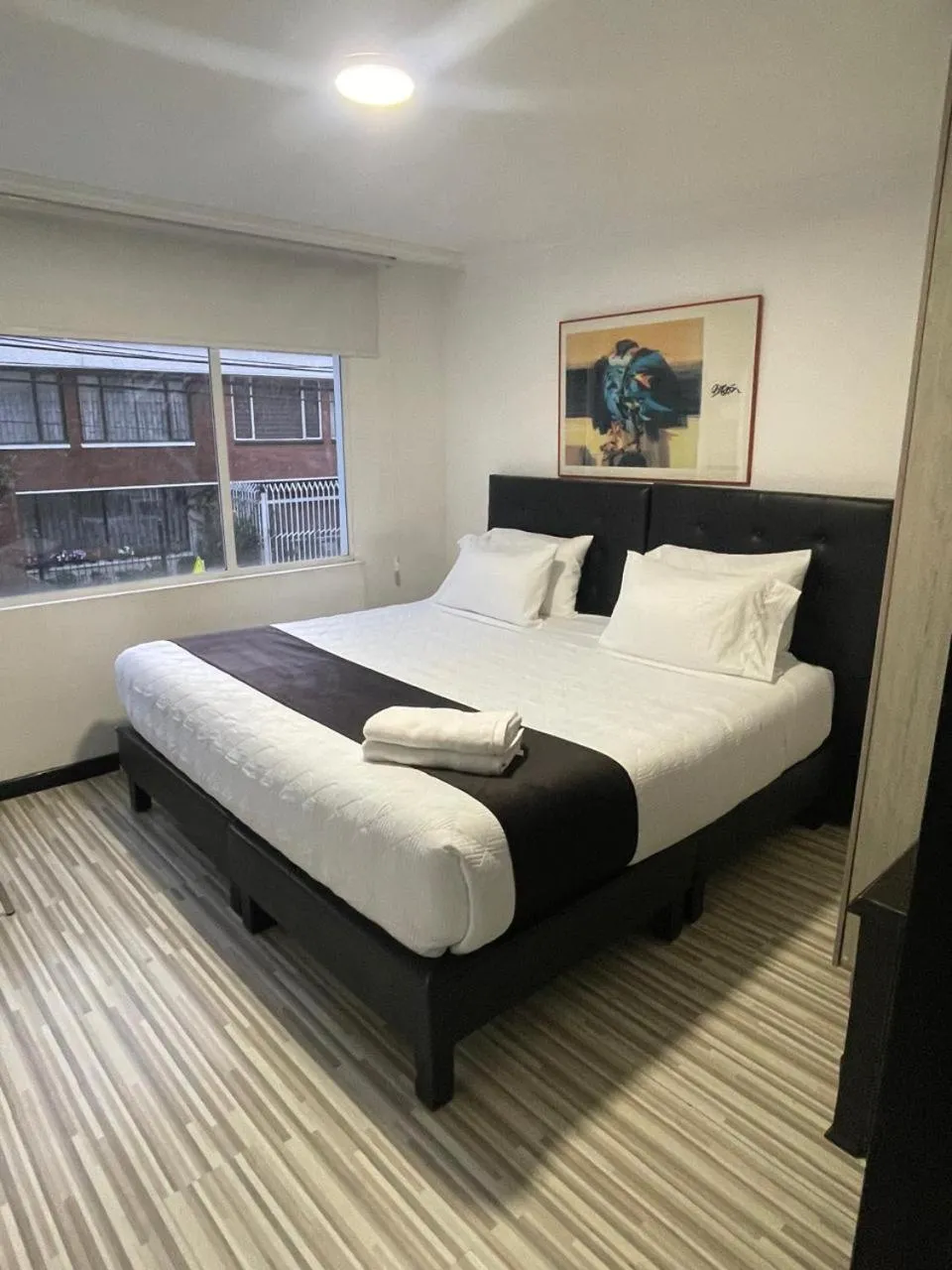 Bed in Hotel AMBAR KING