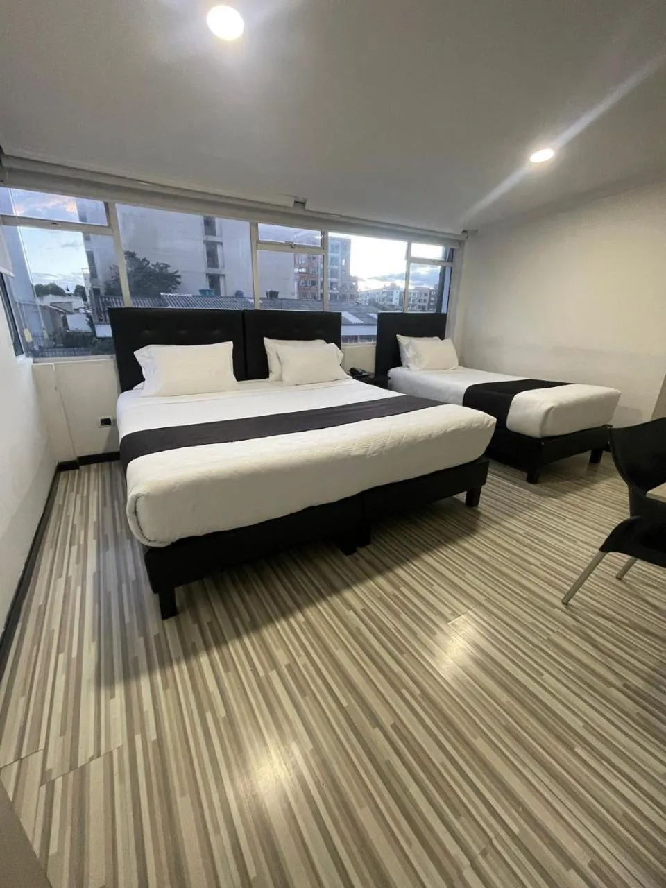 Bed in Hotel AMBAR KING