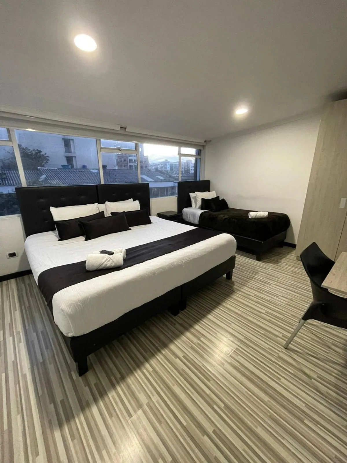 Bed in Hotel AMBAR KING