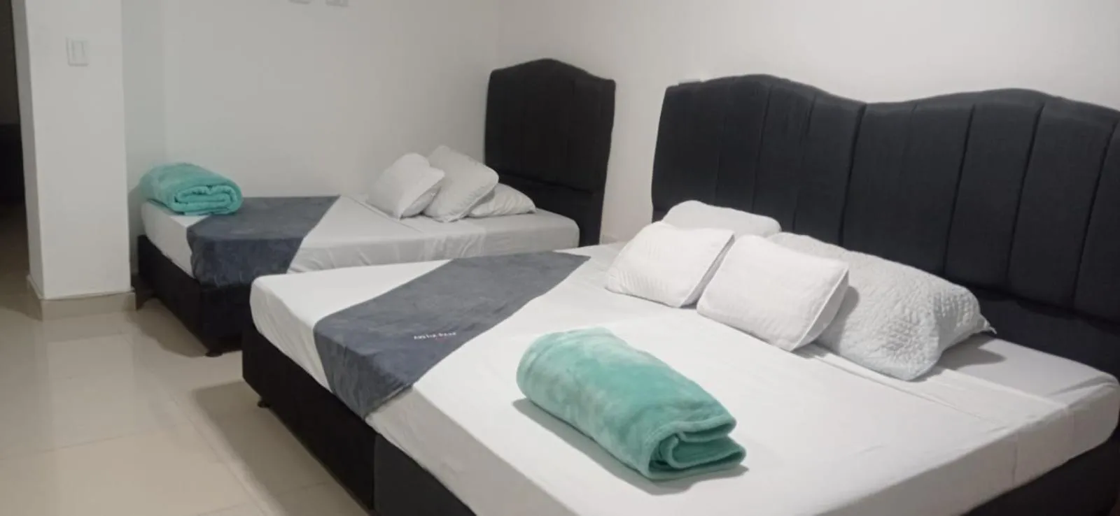Bed in Hotel JARDIN PLAZA BY SGH