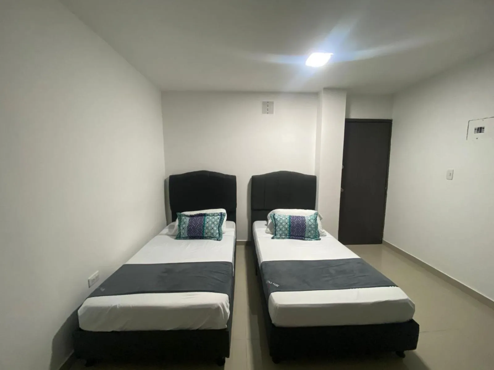 Bed in Hotel JARDIN PLAZA BY SGH