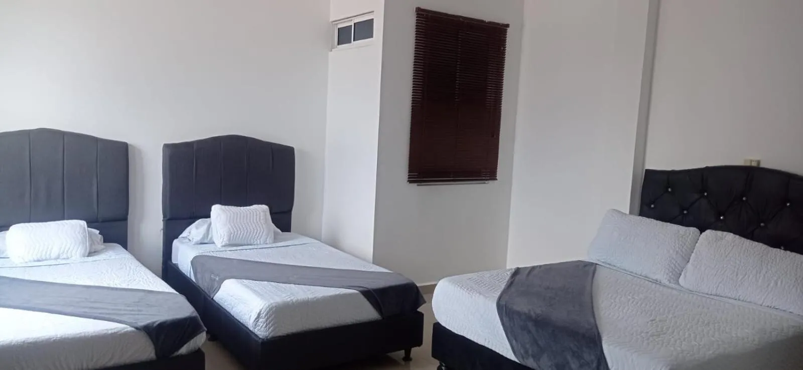 Bed in Hotel JARDIN PLAZA BY SGH