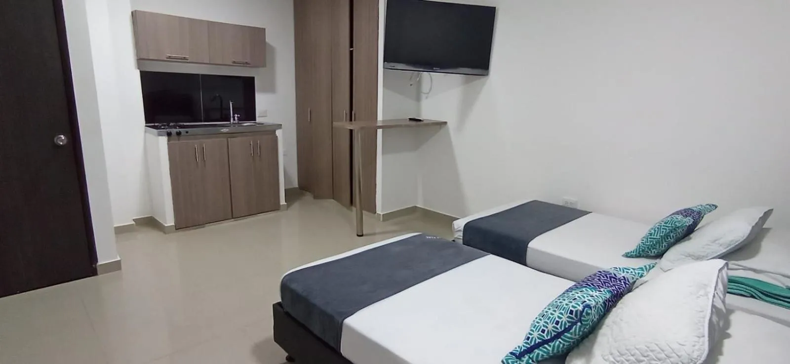 Bed in Hotel JARDIN PLAZA BY SGH