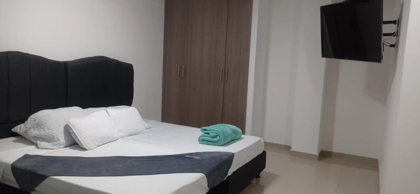 Bed in Hotel JARDIN PLAZA BY SGH