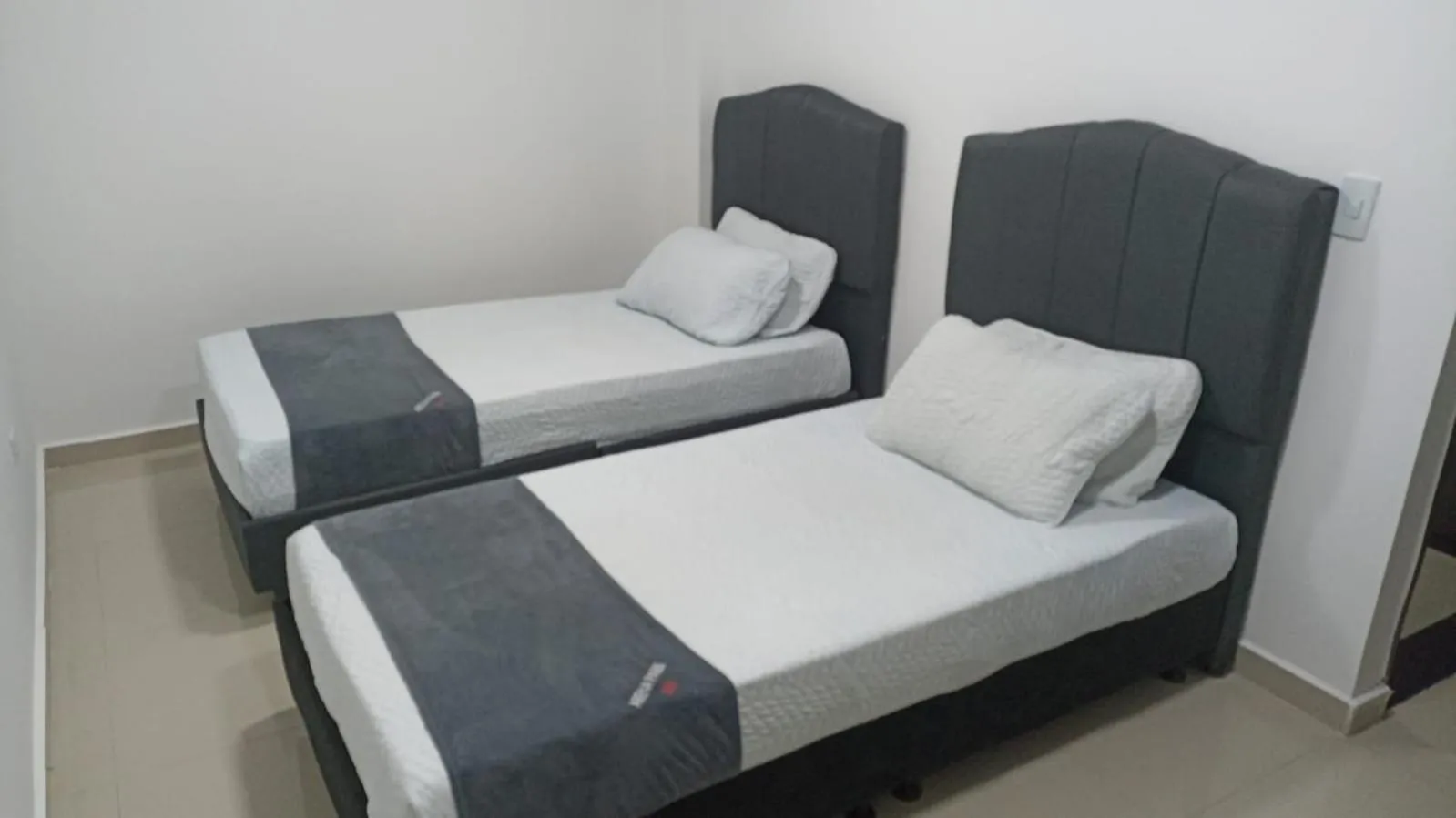 Bed in Hotel JARDIN PLAZA BY SGH