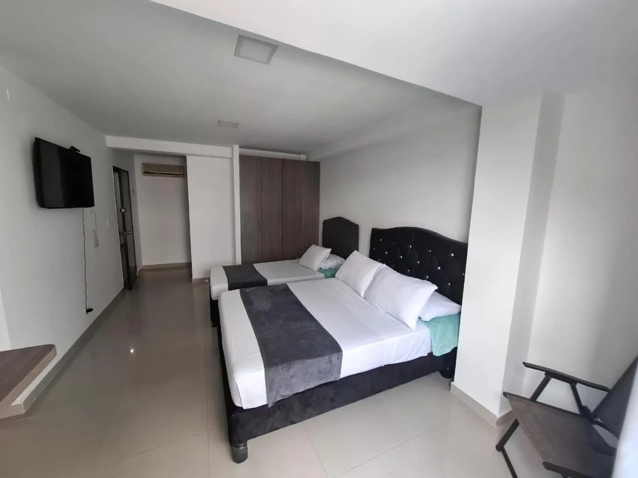 Bed in Hotel JARDIN PLAZA BY SGH