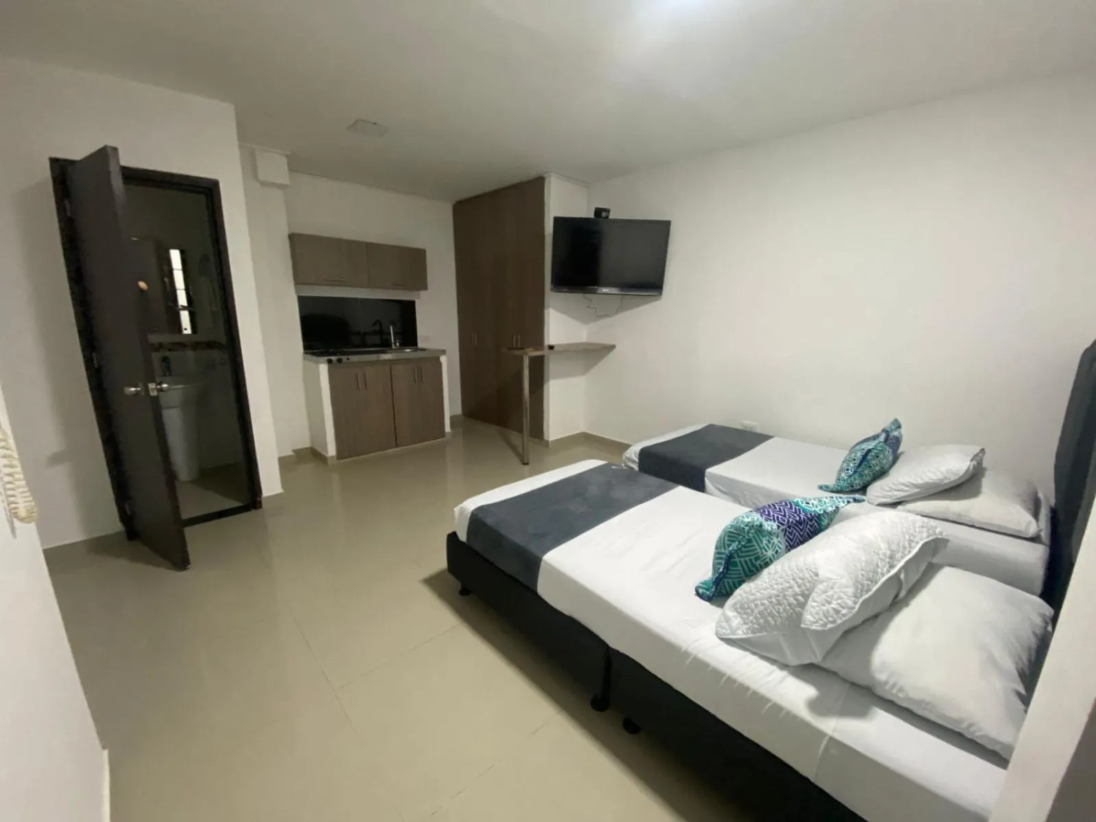 Bed in Hotel JARDIN PLAZA BY SGH