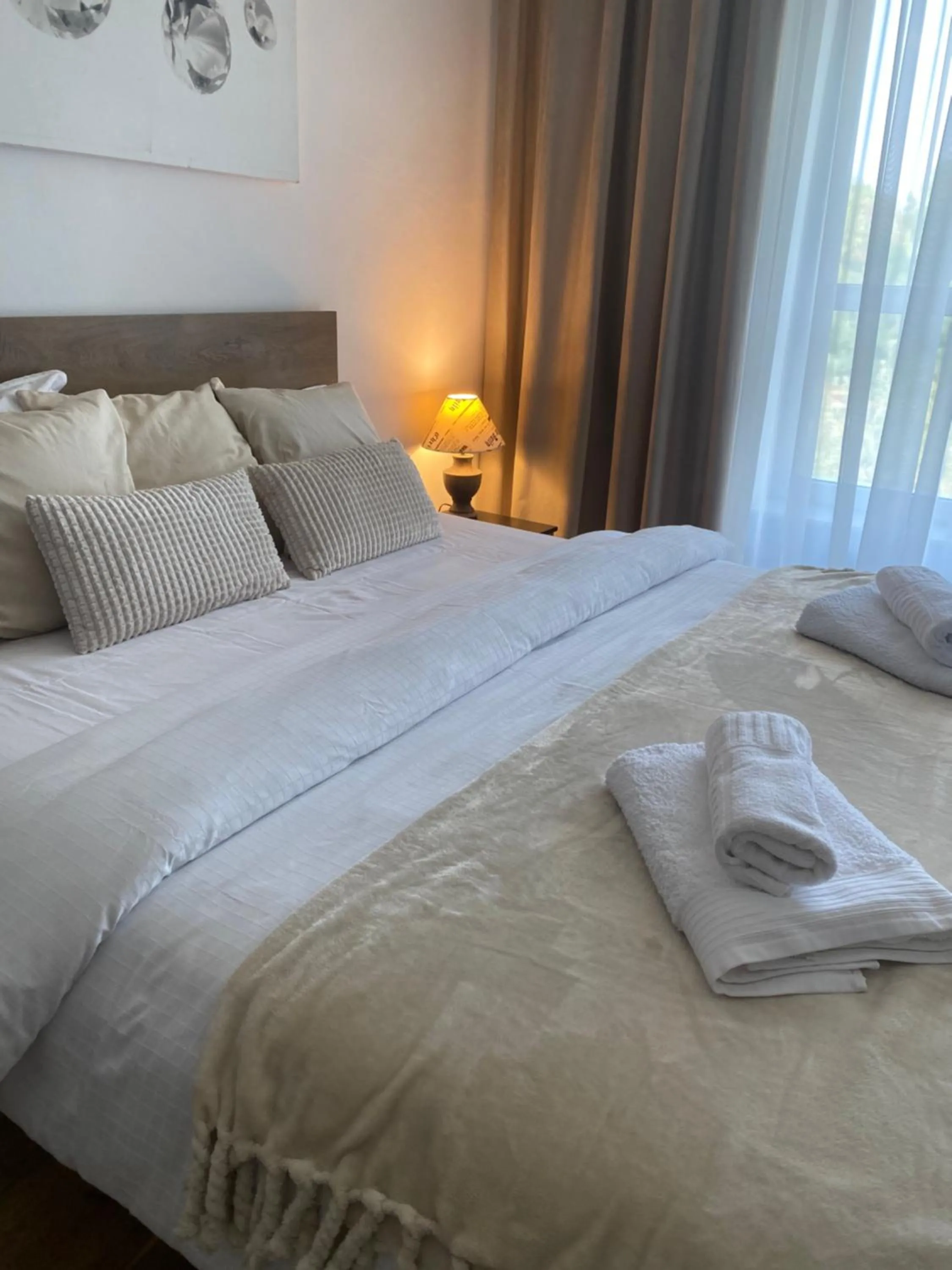 Bed in Muha ApartHotel