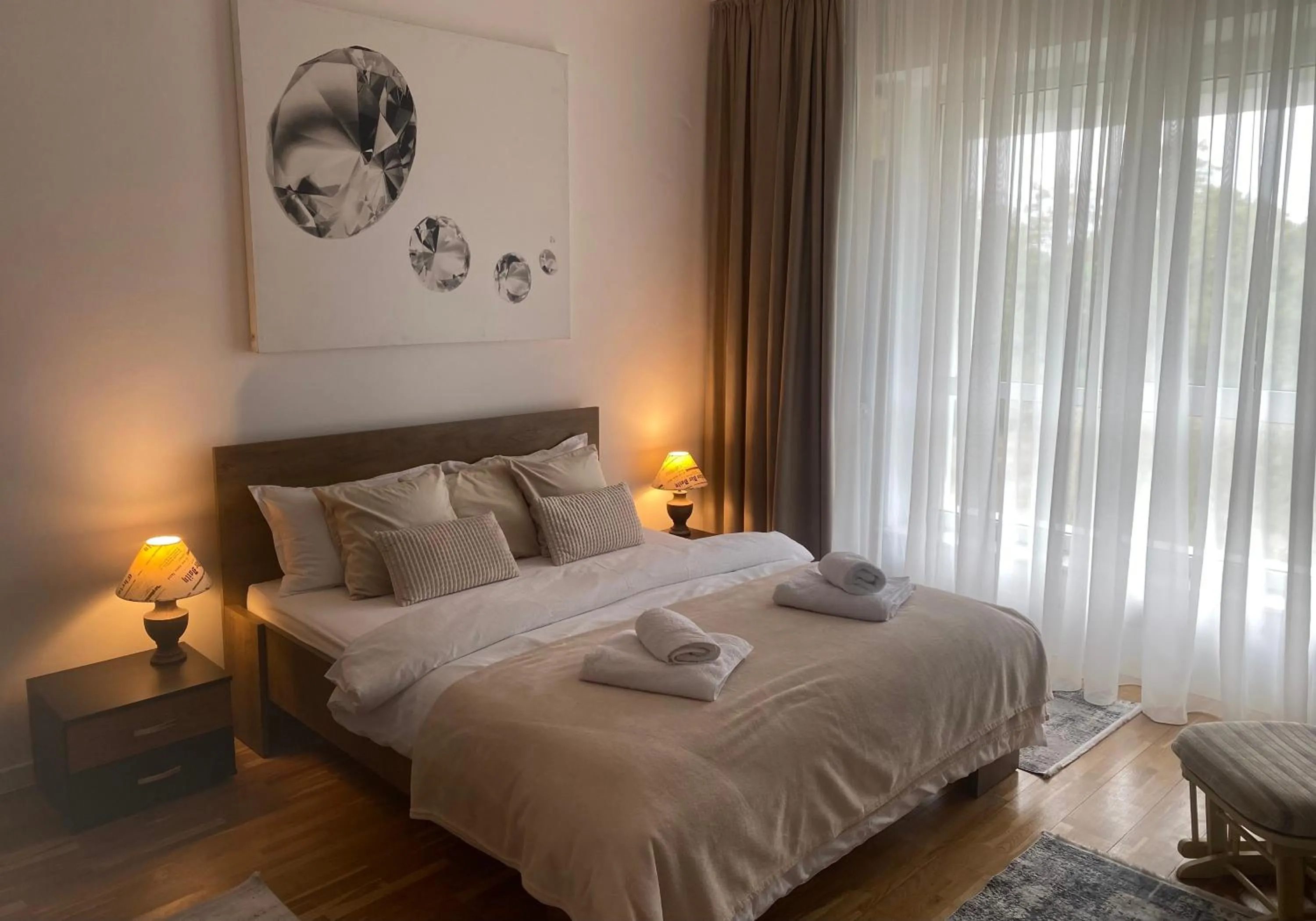 Bed in Muha ApartHotel