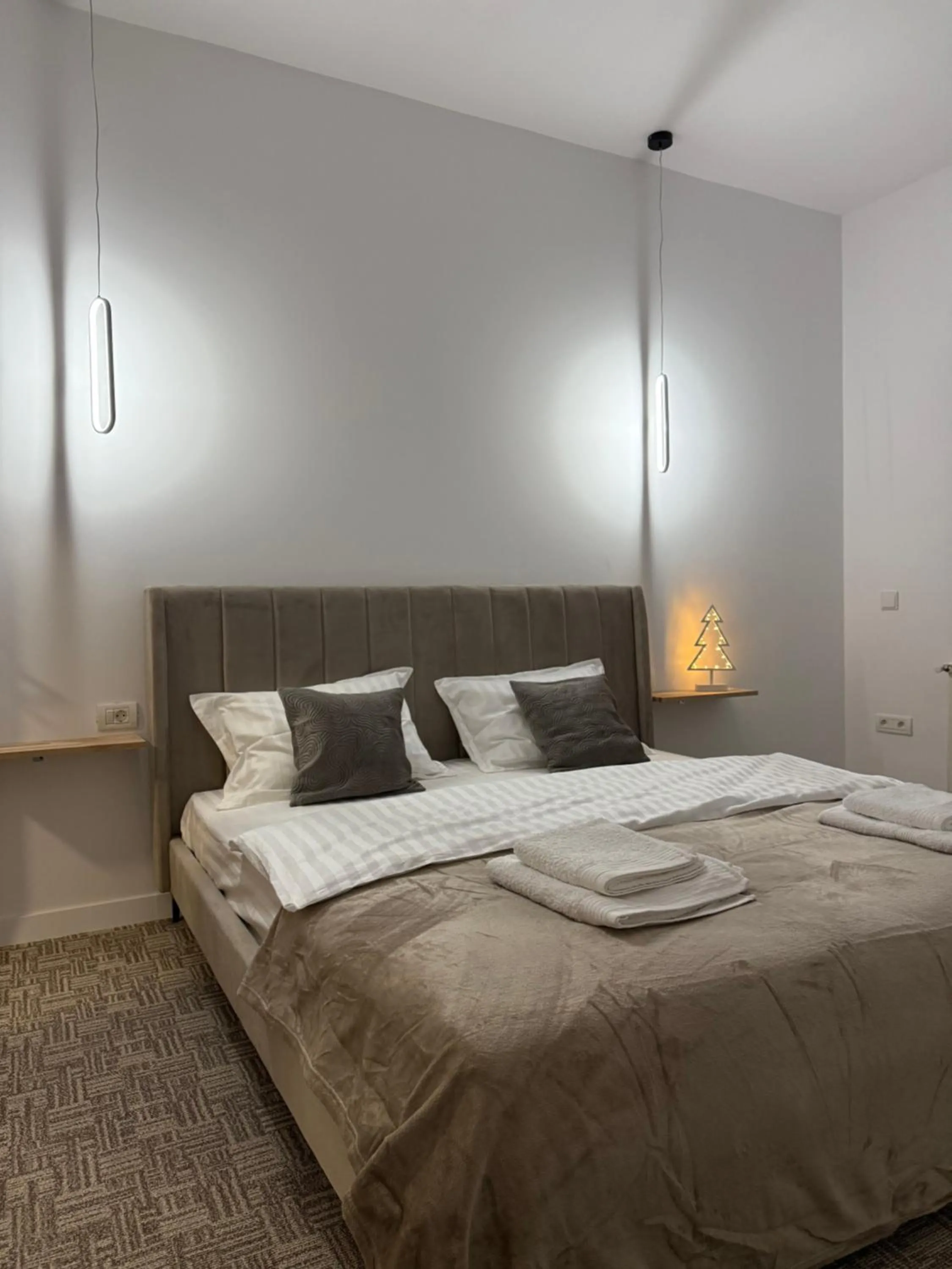 Bed in Muha ApartHotel