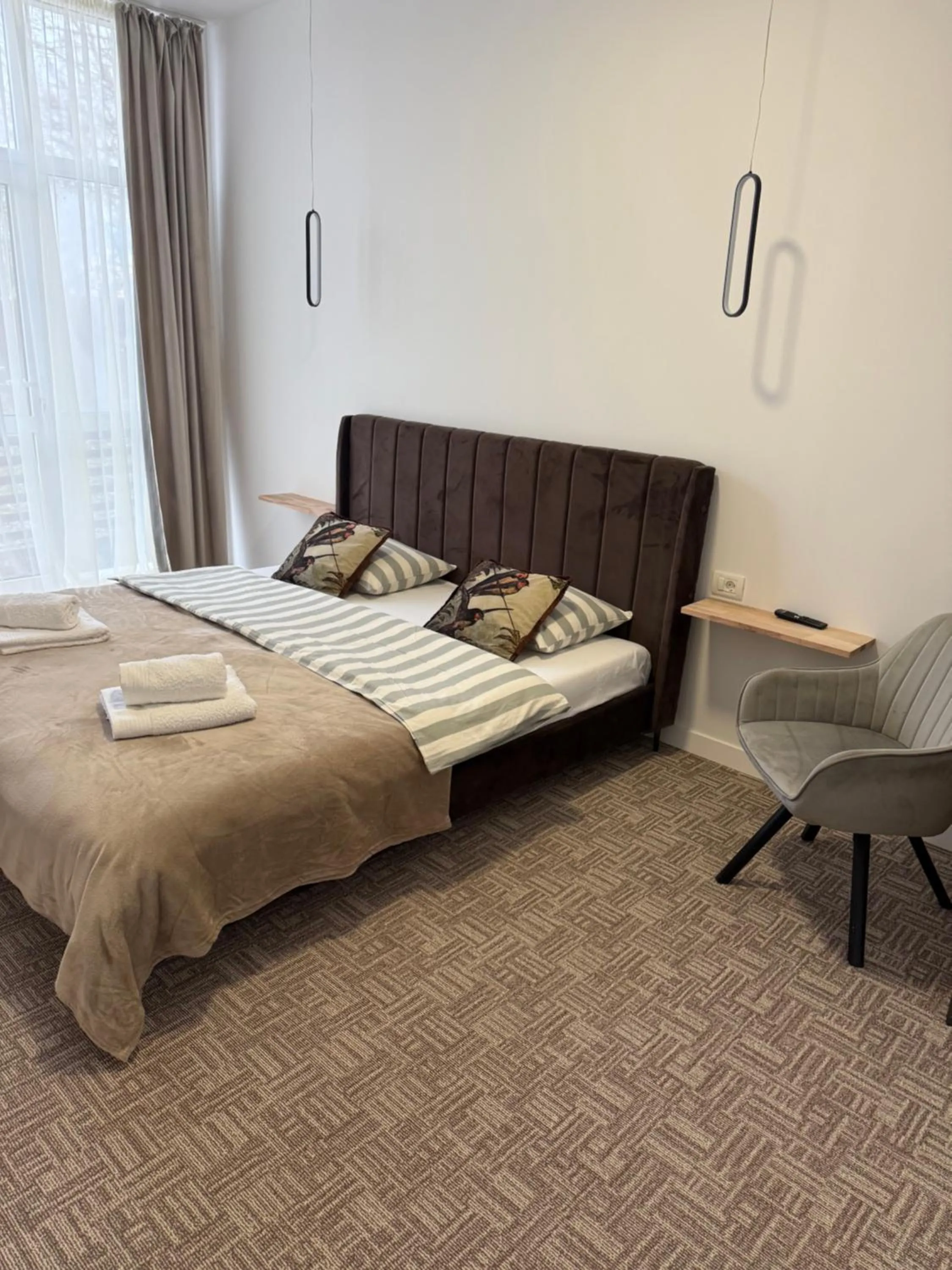 Bed in Muha ApartHotel