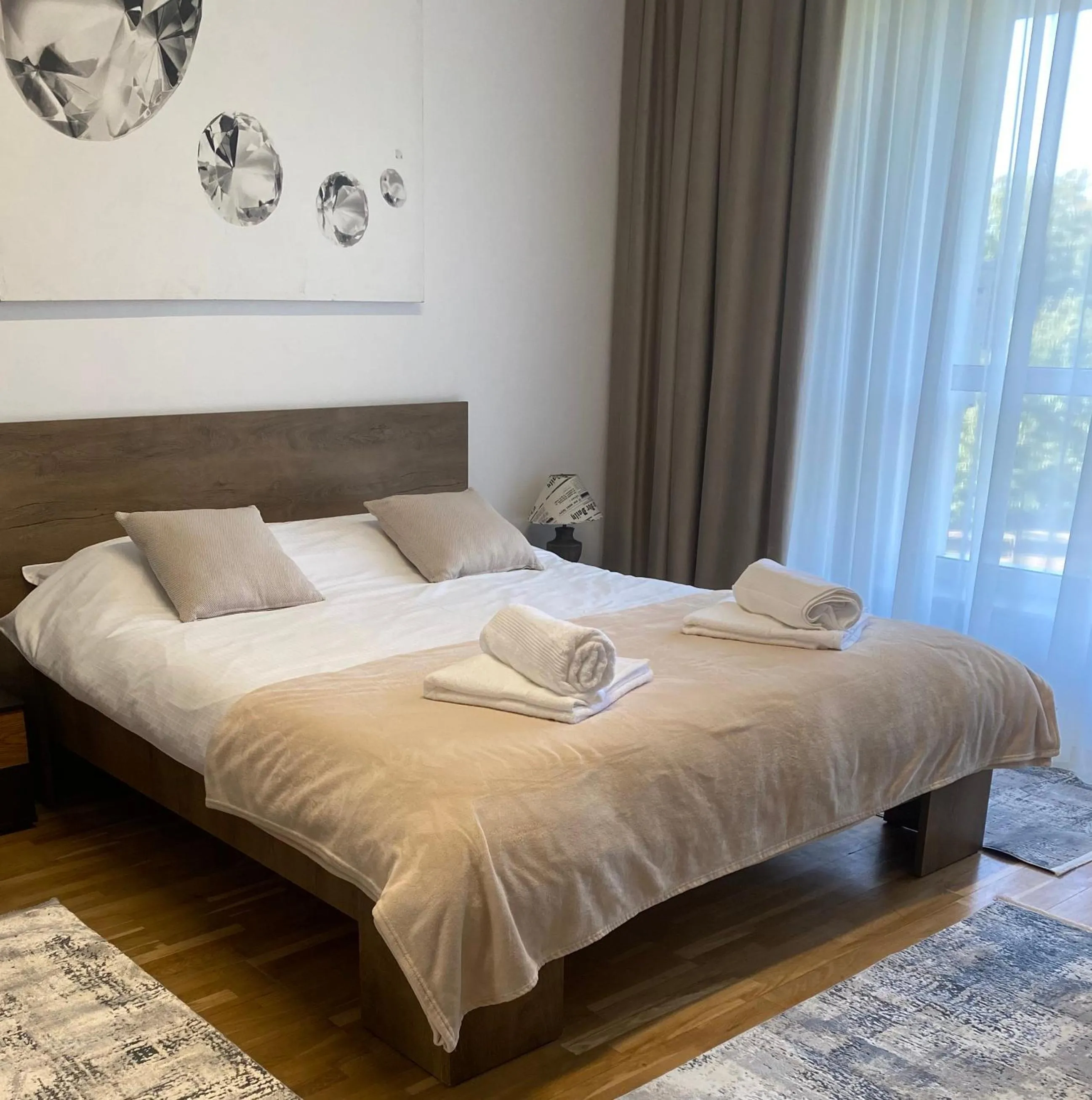 Bed in Muha ApartHotel