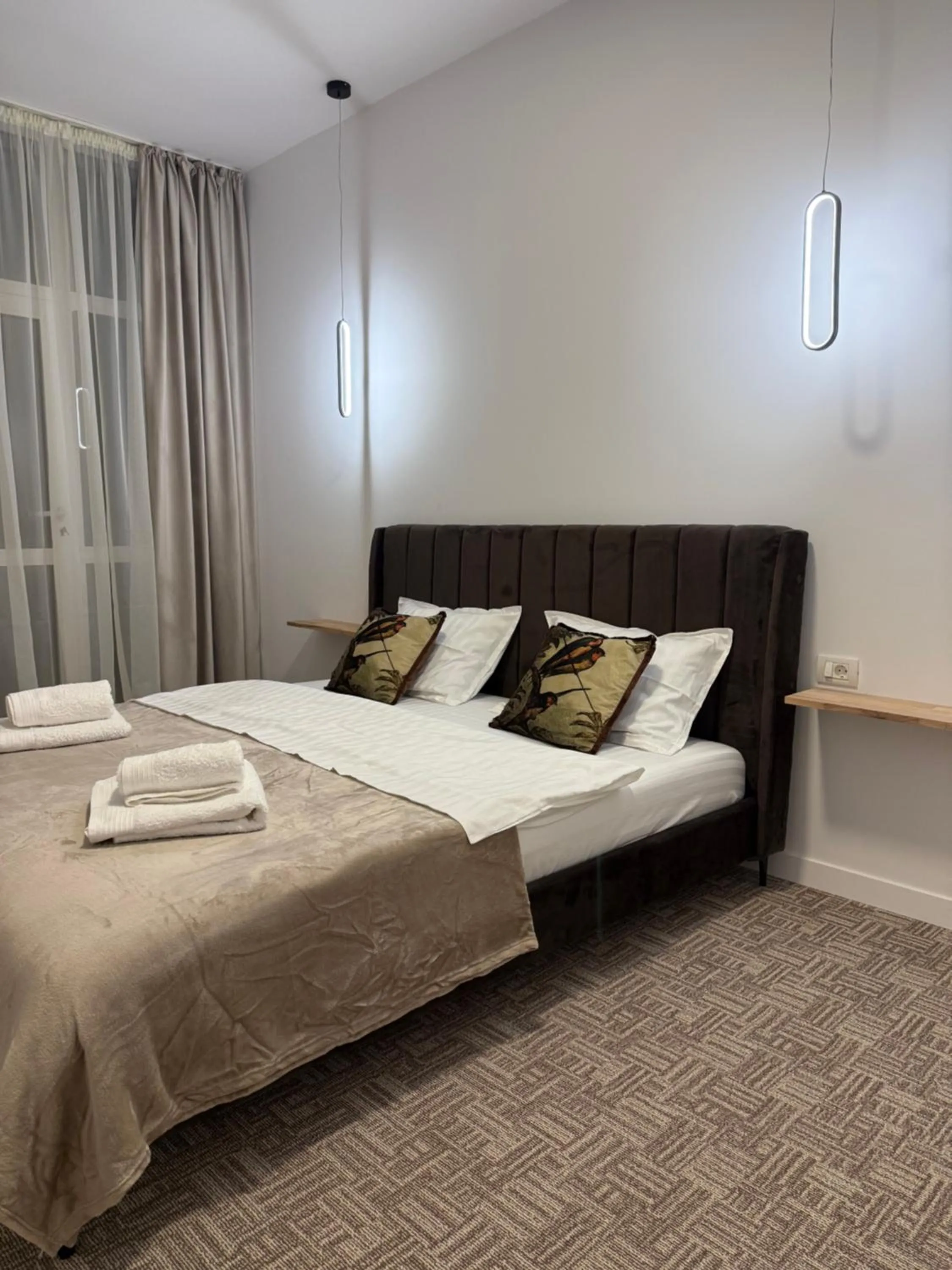Bed in Muha ApartHotel