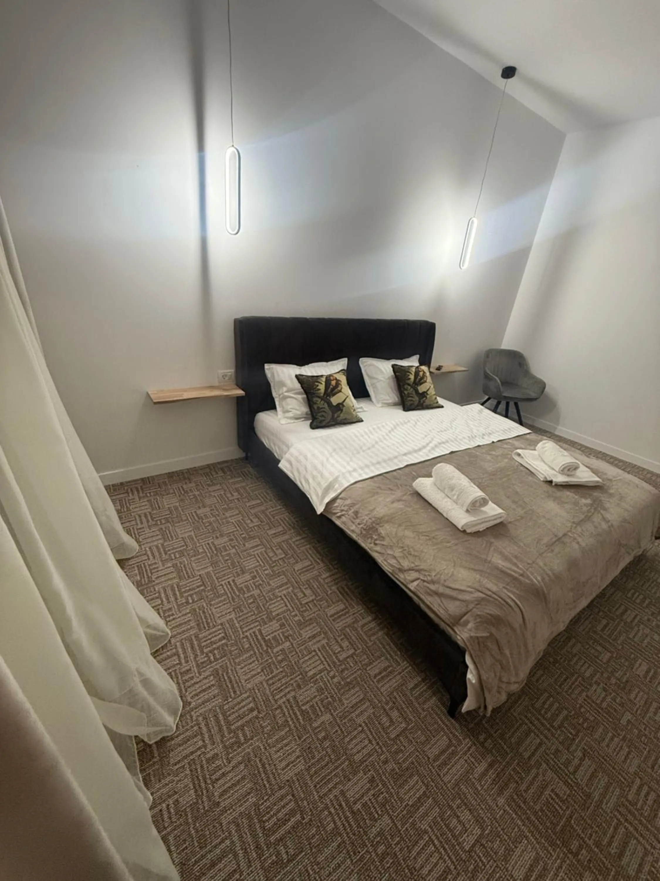 Bed in Muha ApartHotel